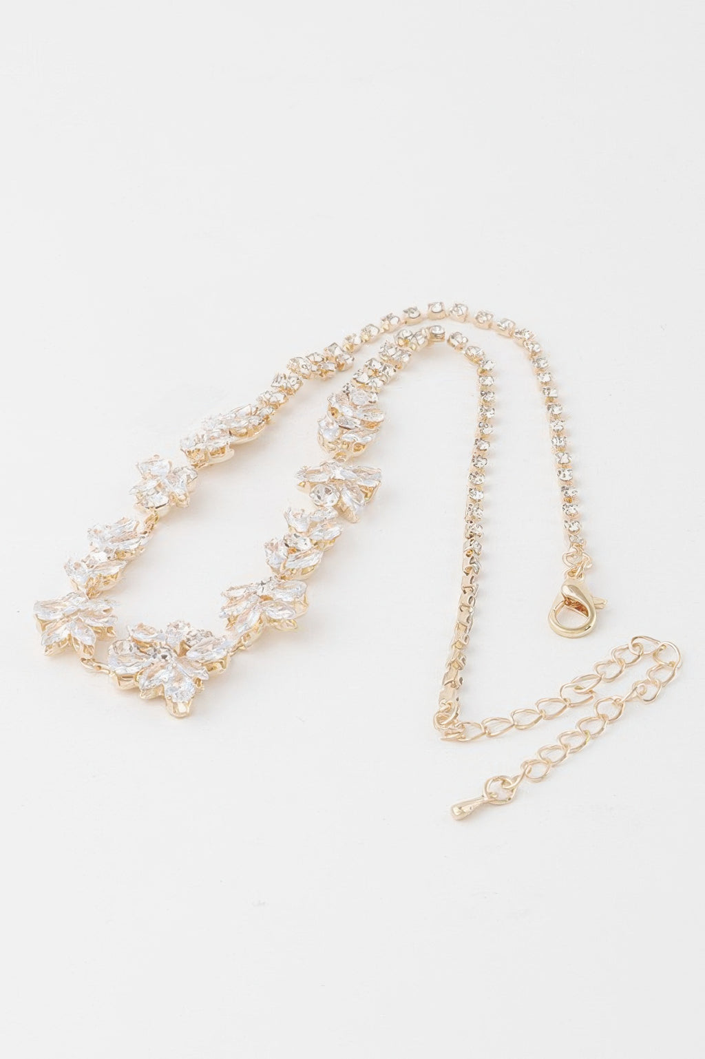 Crystal flower charm necklace, gold-tone clear crystal flower design with clasp