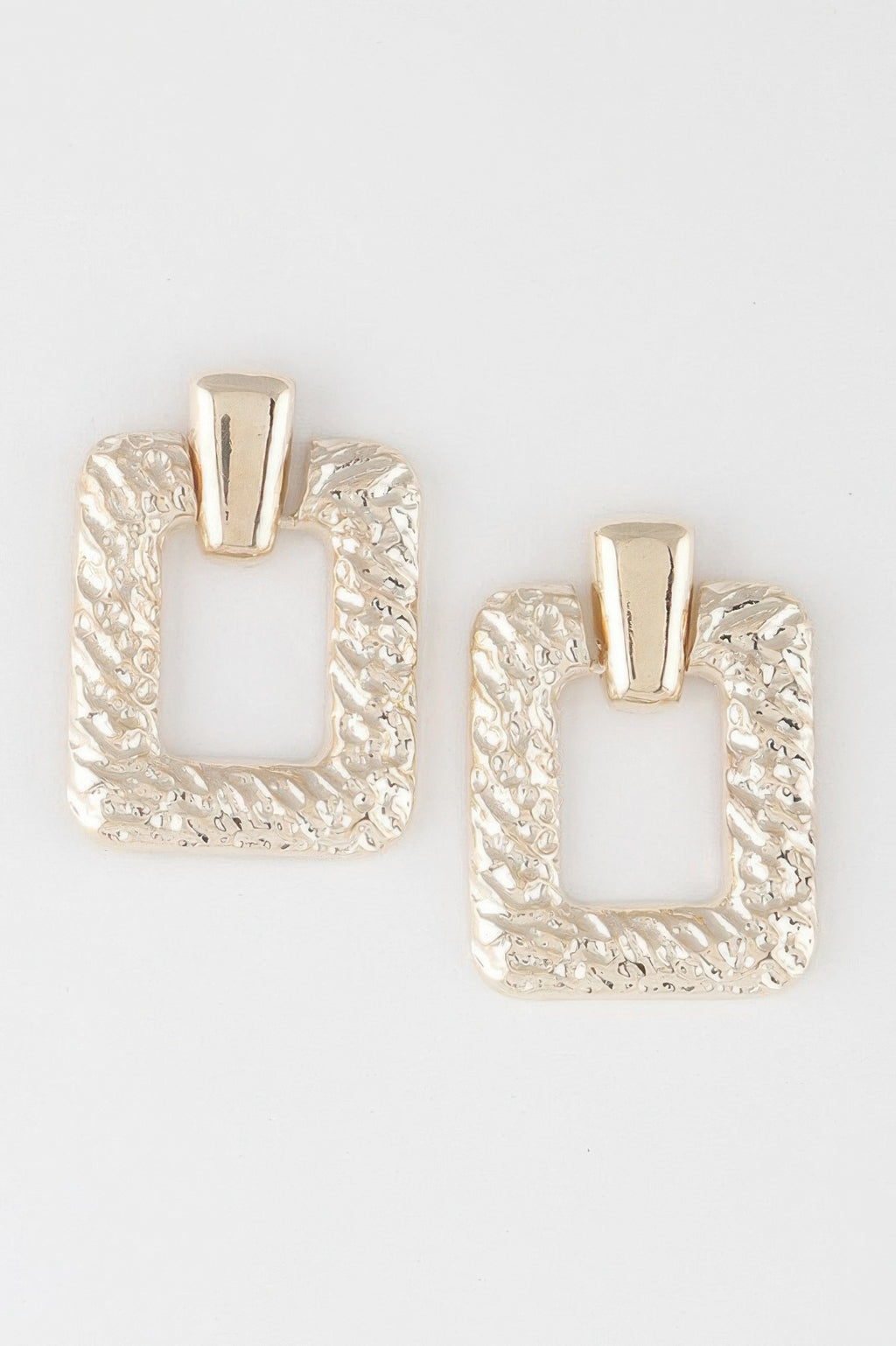 Hammered frame cut earrings in gold tone, square cutout with top bar