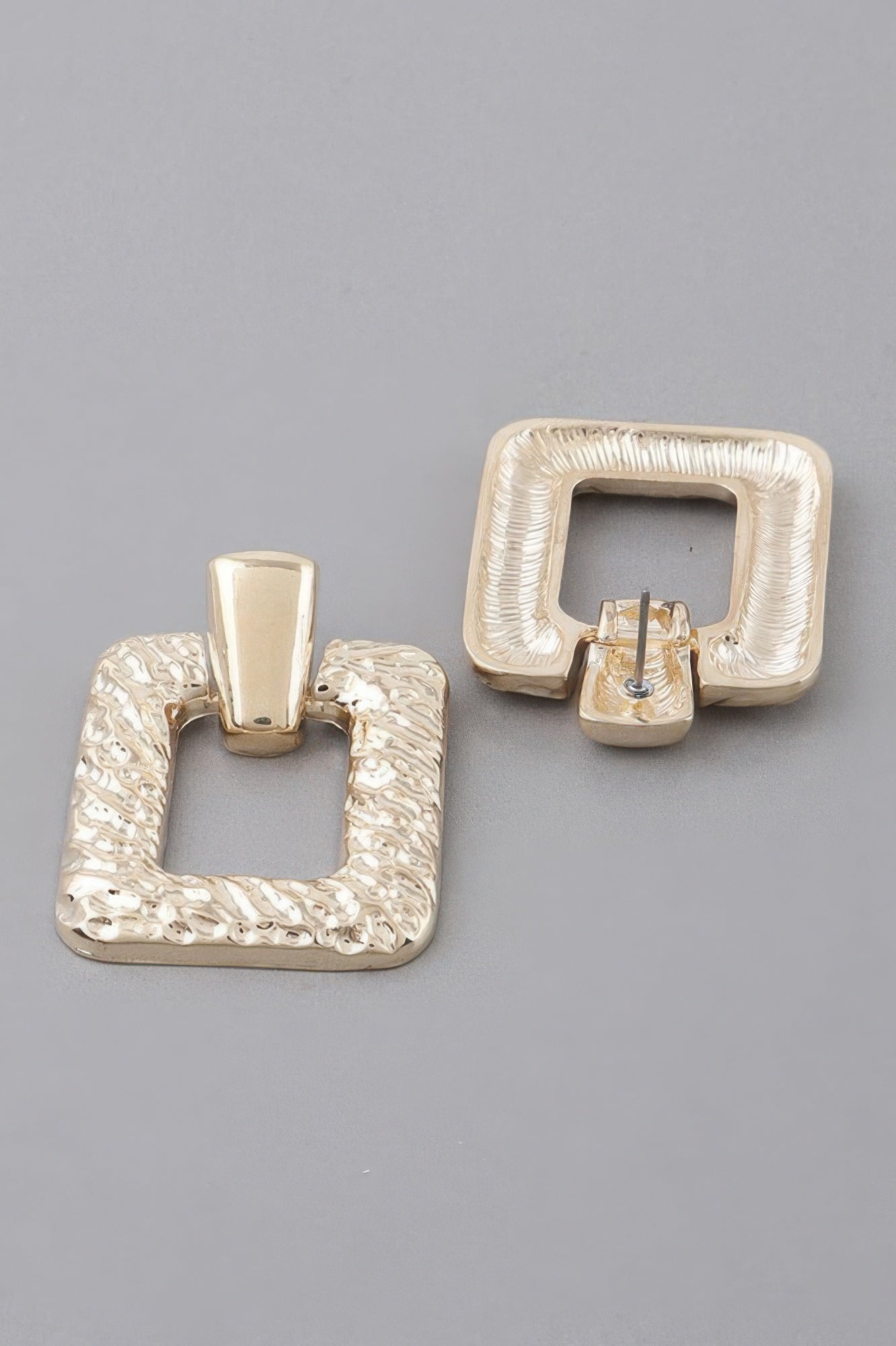 Gold-tone hammered frame cut earrings, square frame with central cutout