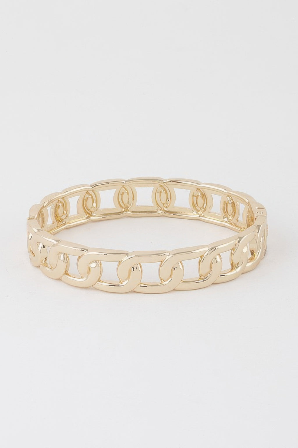 Gold curb chain cuff bracelet, wide top view of interlocking links