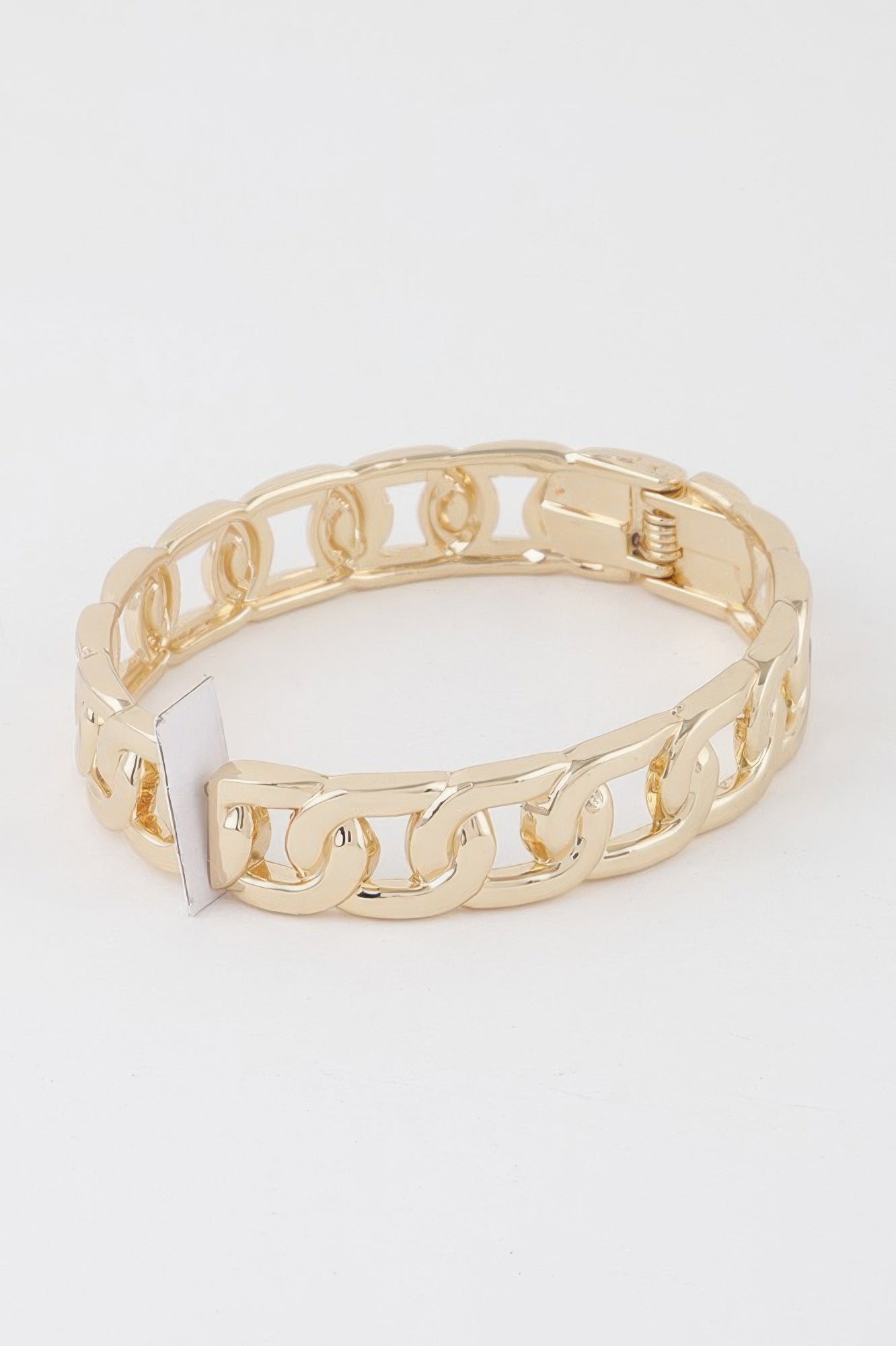 Gold curb chain cuff bracelet with open hinge clasp and flat link band