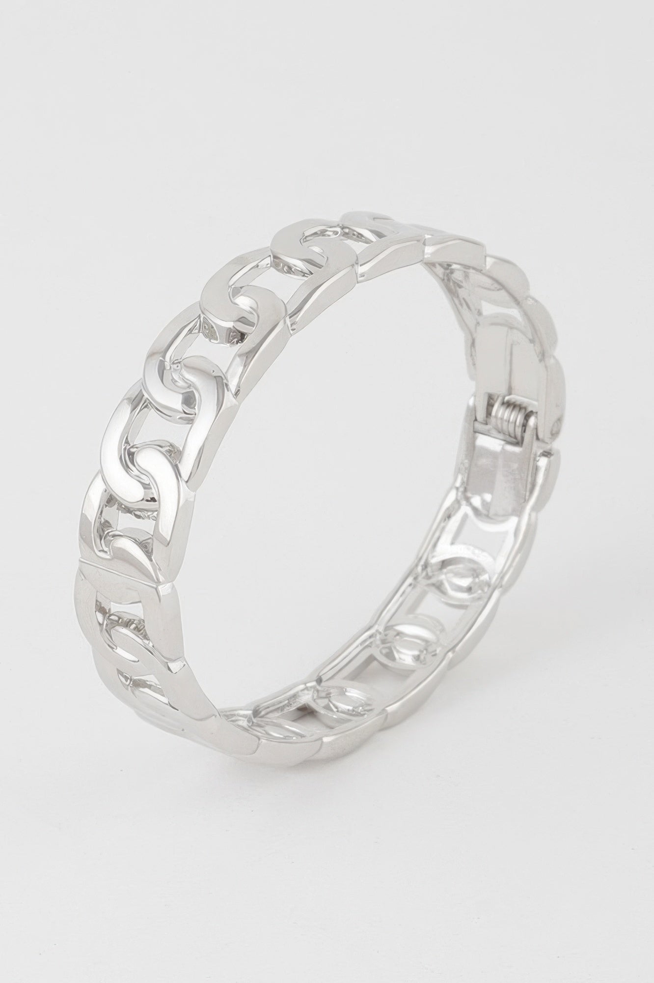 Silver curb chain cuff bracelet with geometric links and hinged clasp