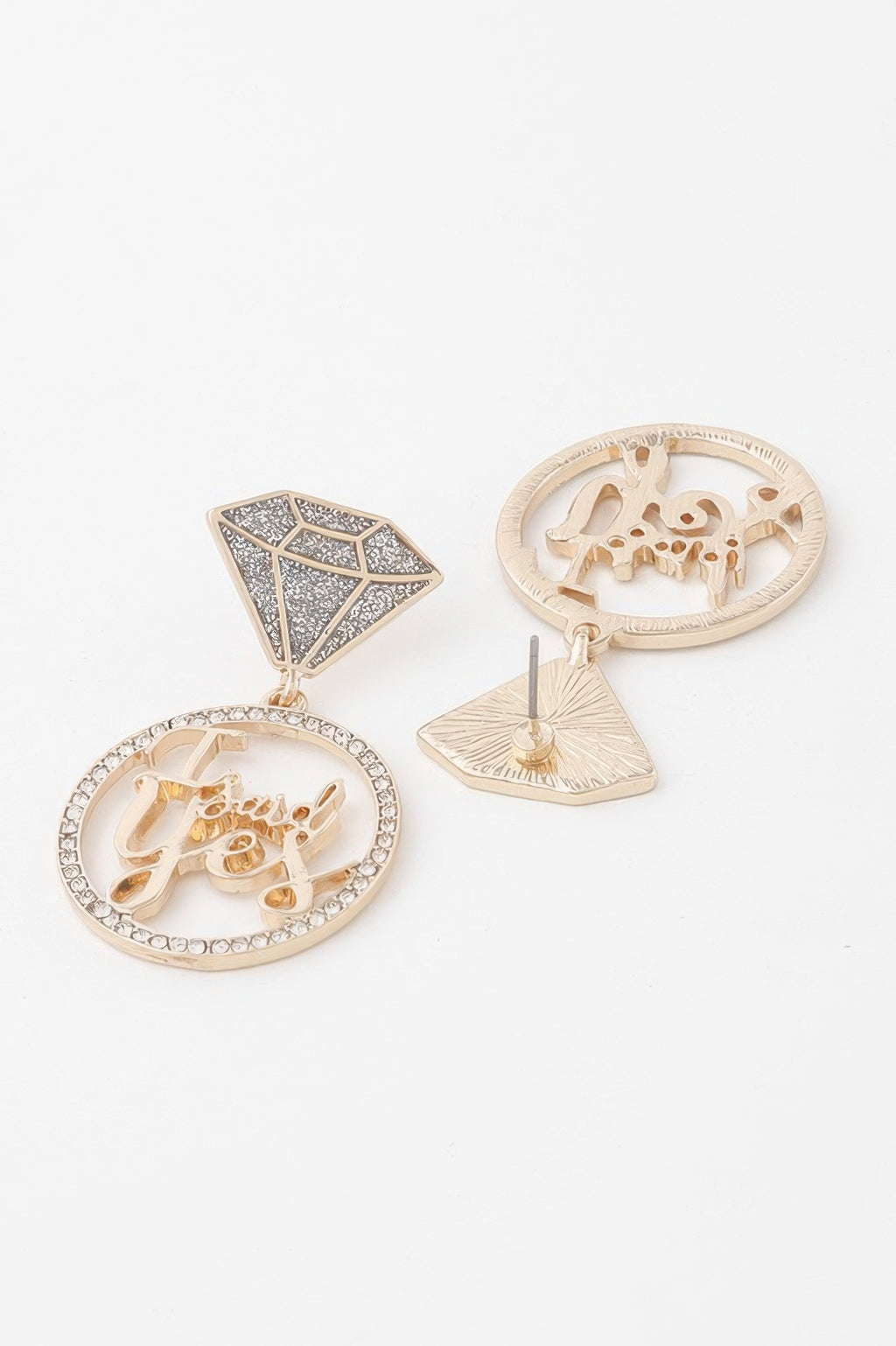 Rhinestone 'I said yes' earrings, shown from side with circular medallion and stud back