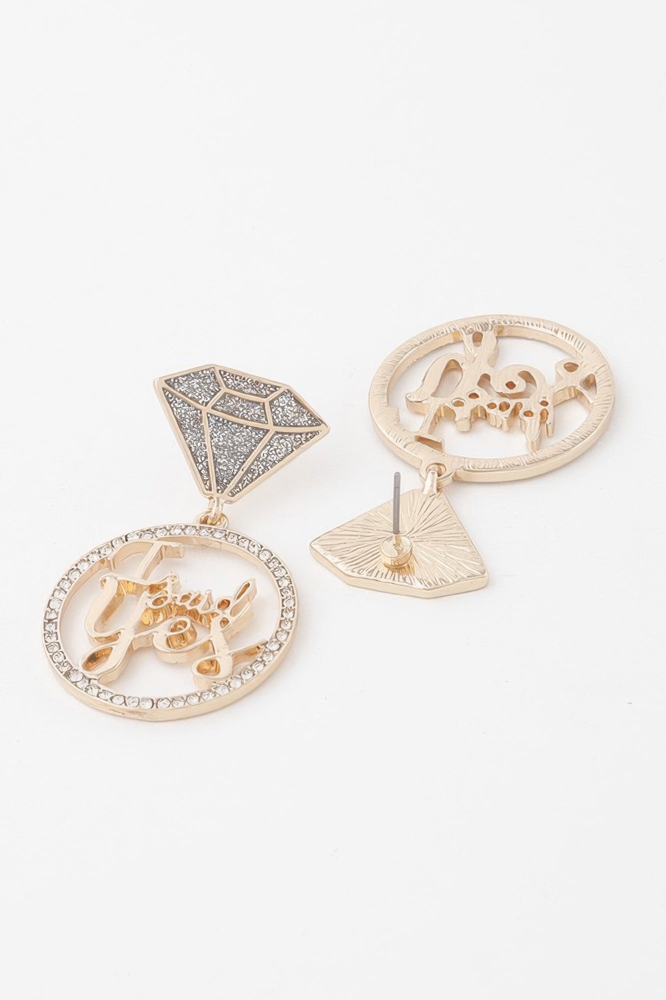 Rhinestone 'I said yes' earrings, shown from side with circular medallion and stud back