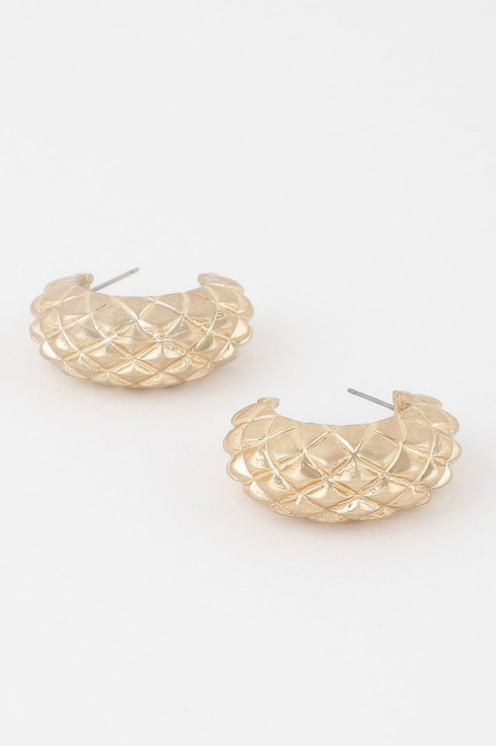 Quilted gold hoop earrings with textured lattice pattern, front view
