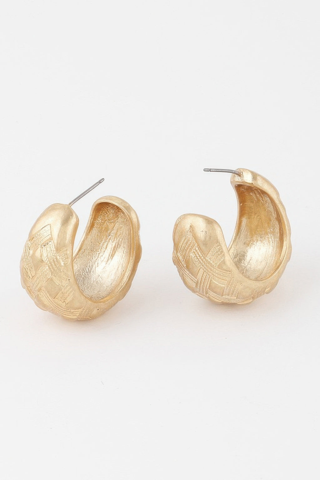 Gold basket-weave hoop earrings, inner curve visible from angled view