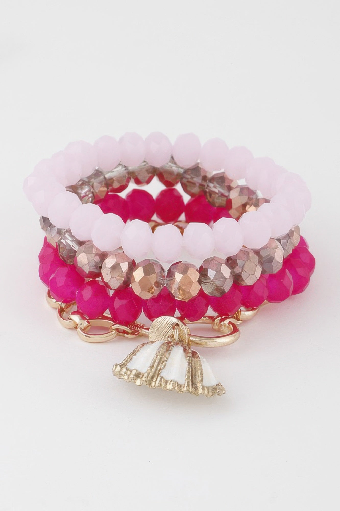 Multi Seashell Crystal Bracelet with layered pink, rose, and clear beads; tassel charm