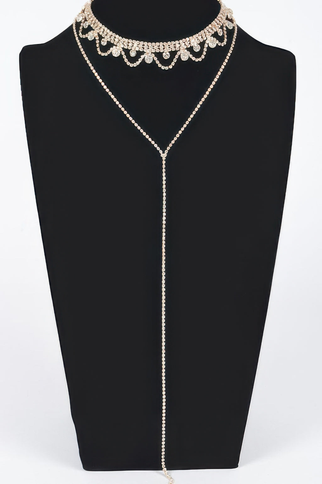 Rhinestone necklace with scalloped choker and long pendant drop, gold tone