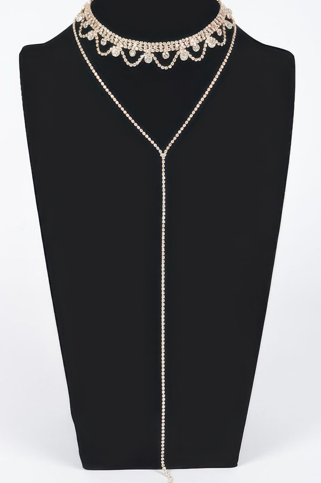 Rhinestone necklace with scalloped choker and long pendant drop, gold tone