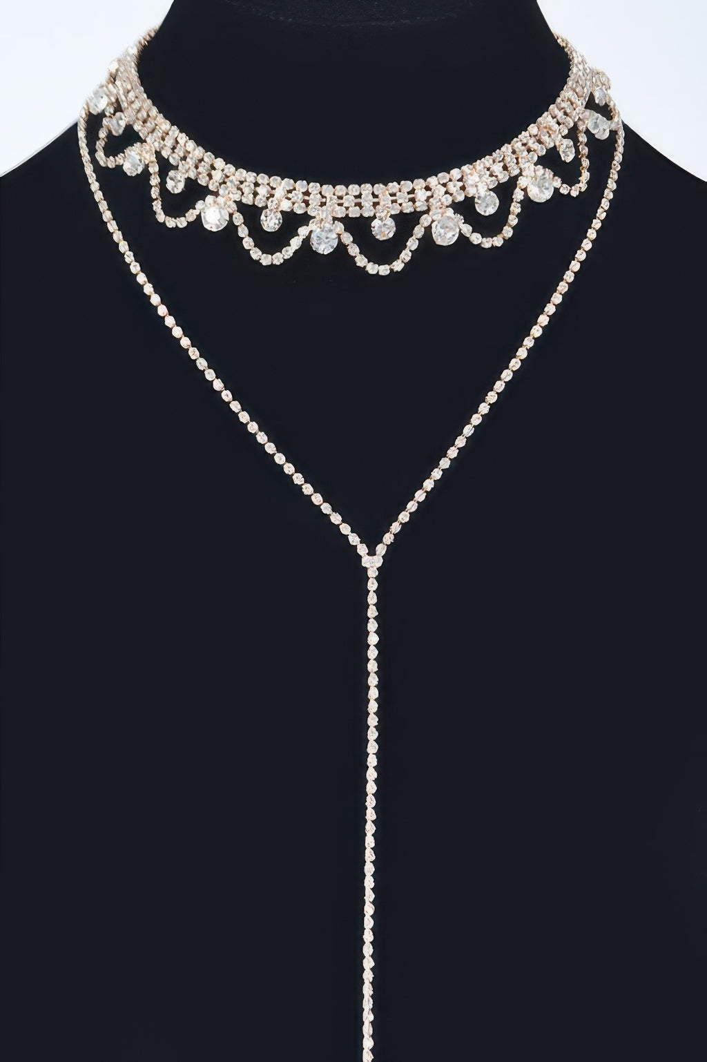 Rhinestone necklace with scalloped choker and long pendant drop, silver tone