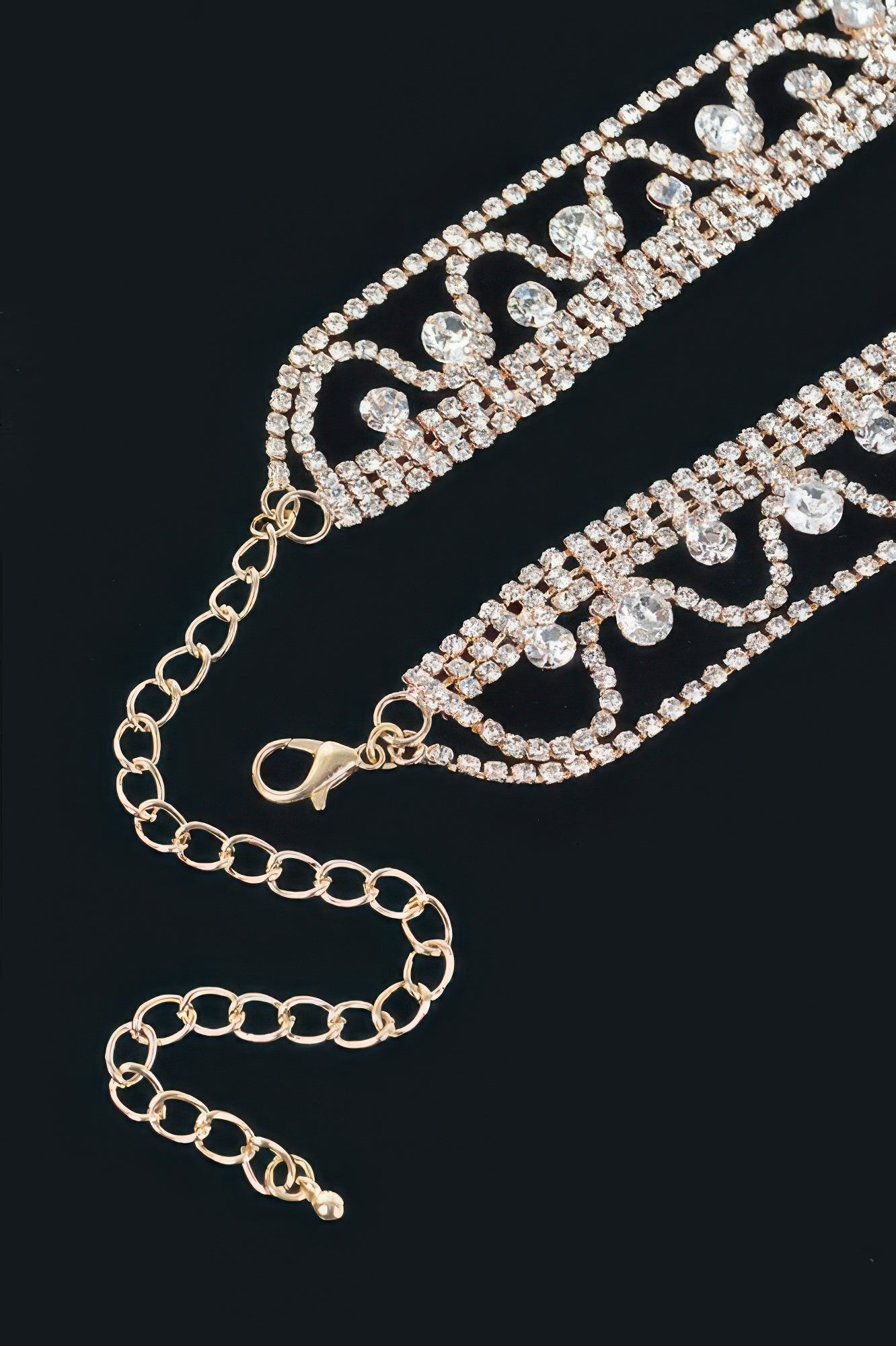 Gold-tone rhinestone collar bracelet-style chain with clasp and heart-shaped stones
