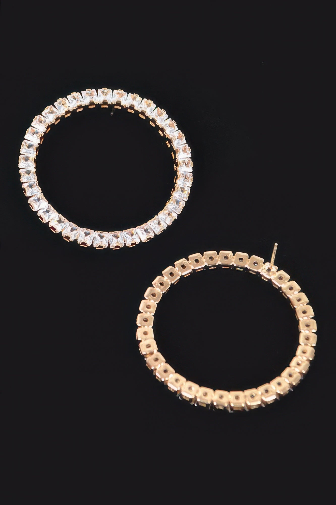 Round rhinestone hoop earrings with clear stones and silver-tone posts