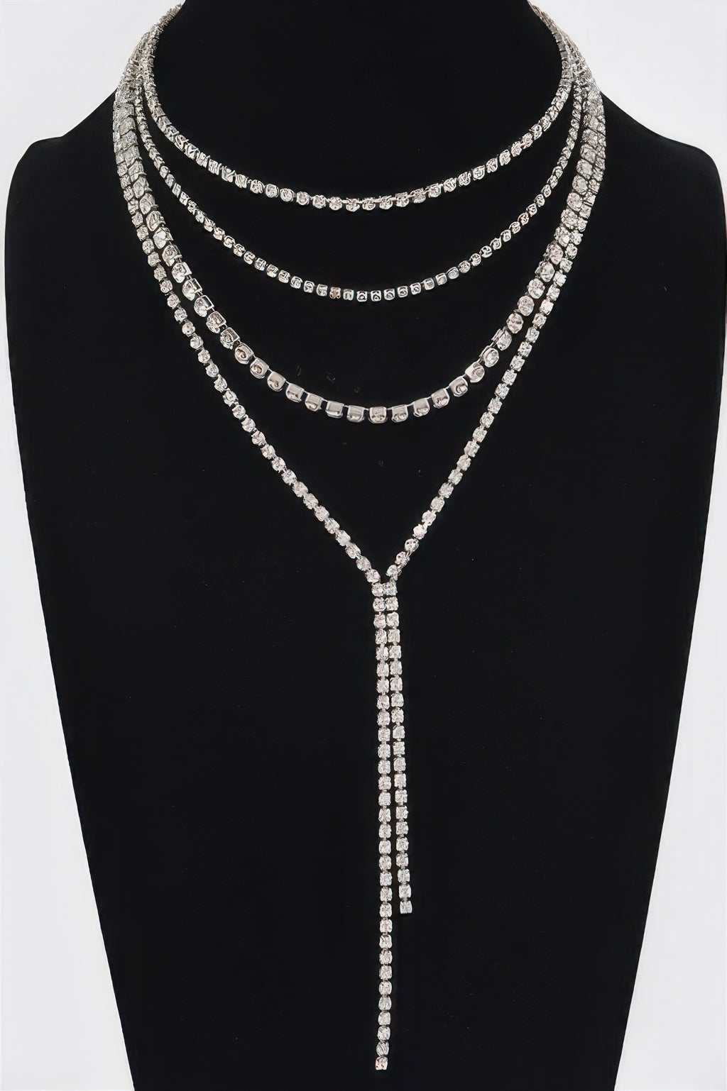 Gold-tone multi-layer rhinestone long necklace with teardrop pendant and 4 linked rows