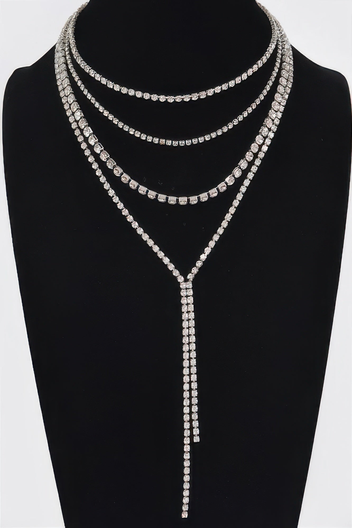 Gold-tone multi-layer rhinestone long necklace with teardrop pendant and 4 linked rows
