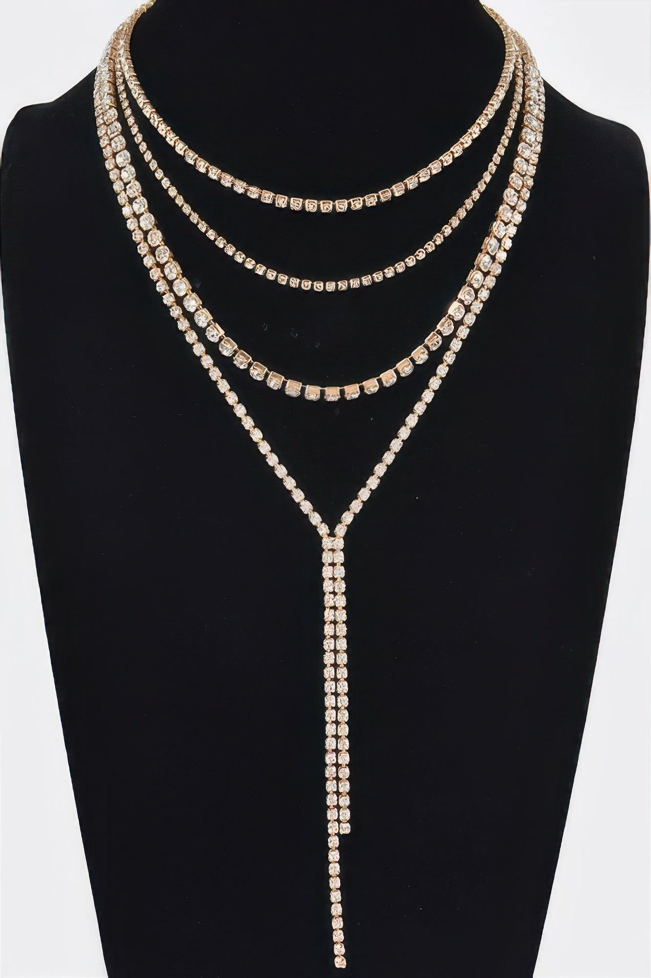Gold-tone multi-layer rhinestone long necklace with layered curves and dangling drop