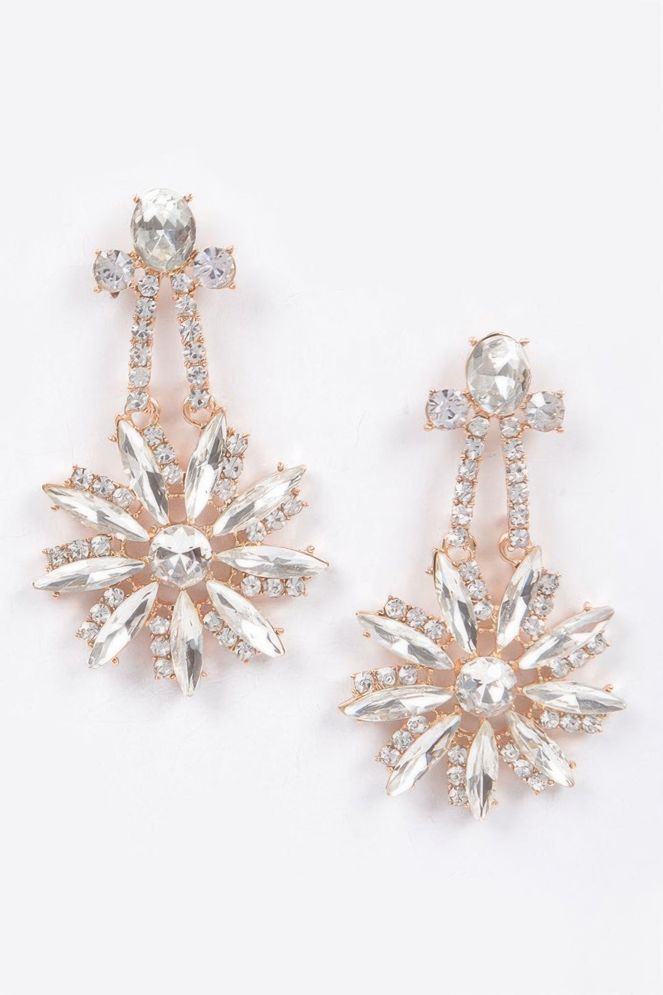 Rhinestone dangle earrings with clear crystal starburst drops and dangling teardrop stones