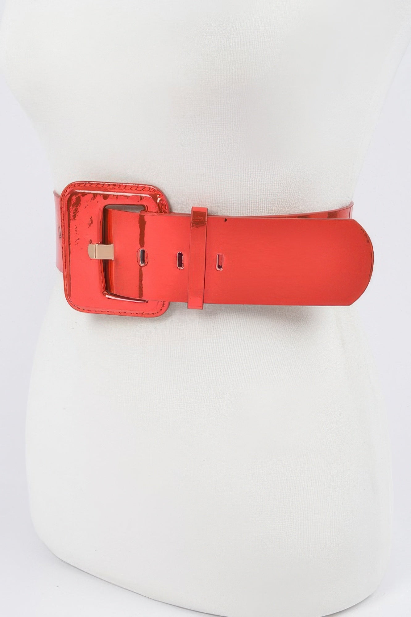 Red wide PU belt, side view of square buckle with metal pin and adjustment holes.