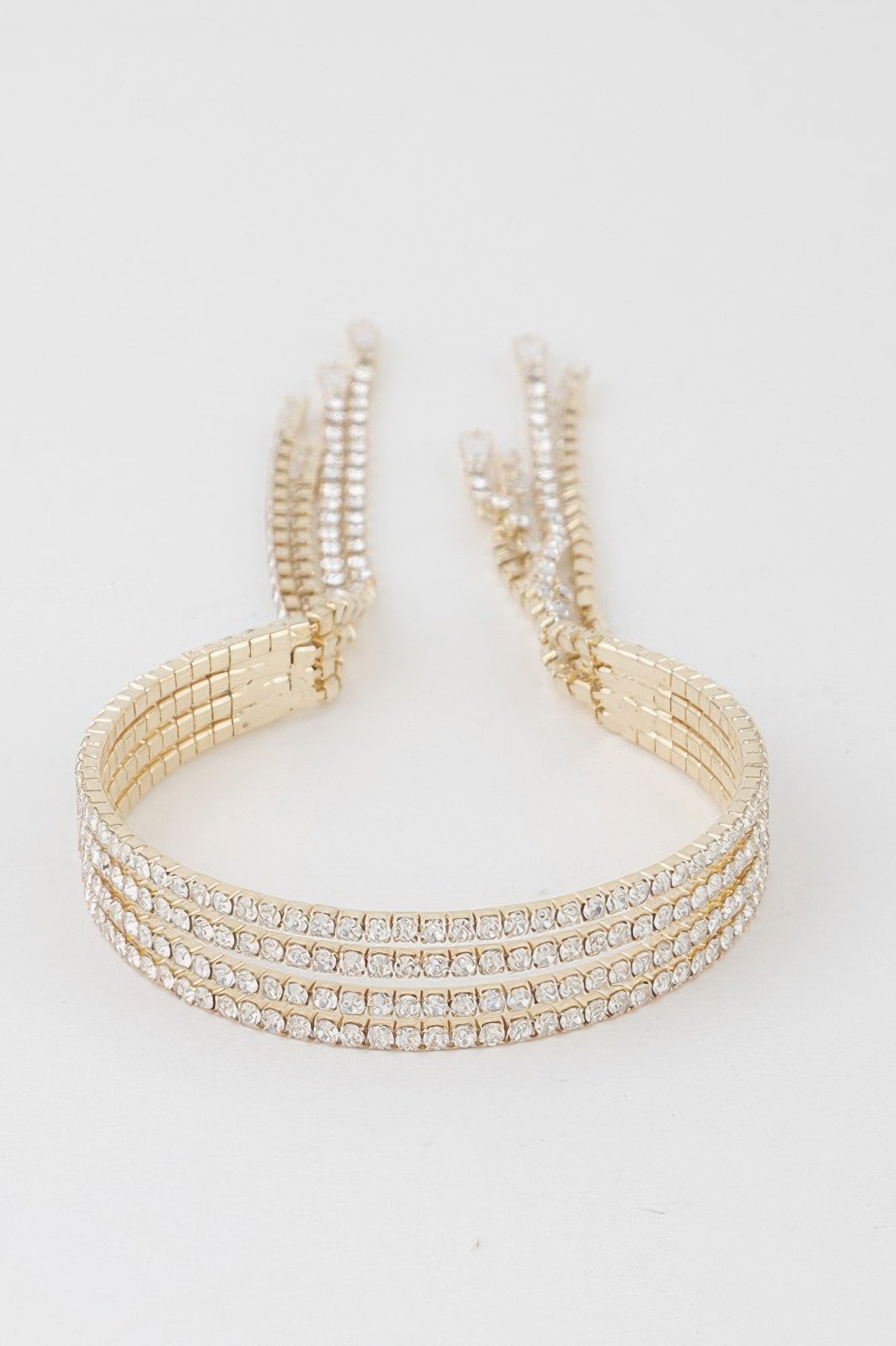 Multi rhinestone drop cuff bracelet, gold-clear tones, wide wrap with dangling ends