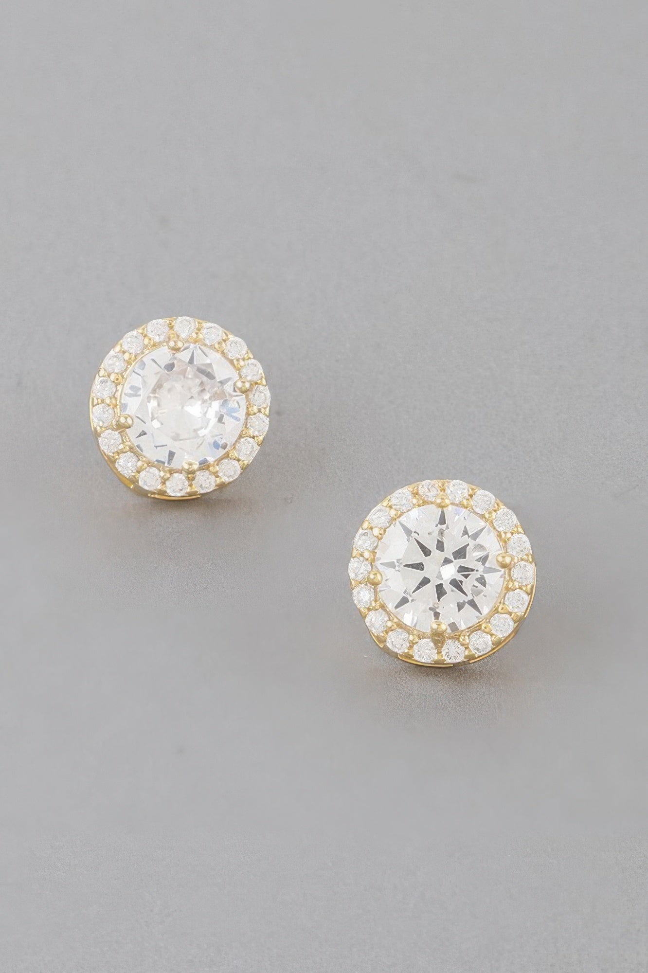 Gold round stud earrings, clear center stone with sparkling halo