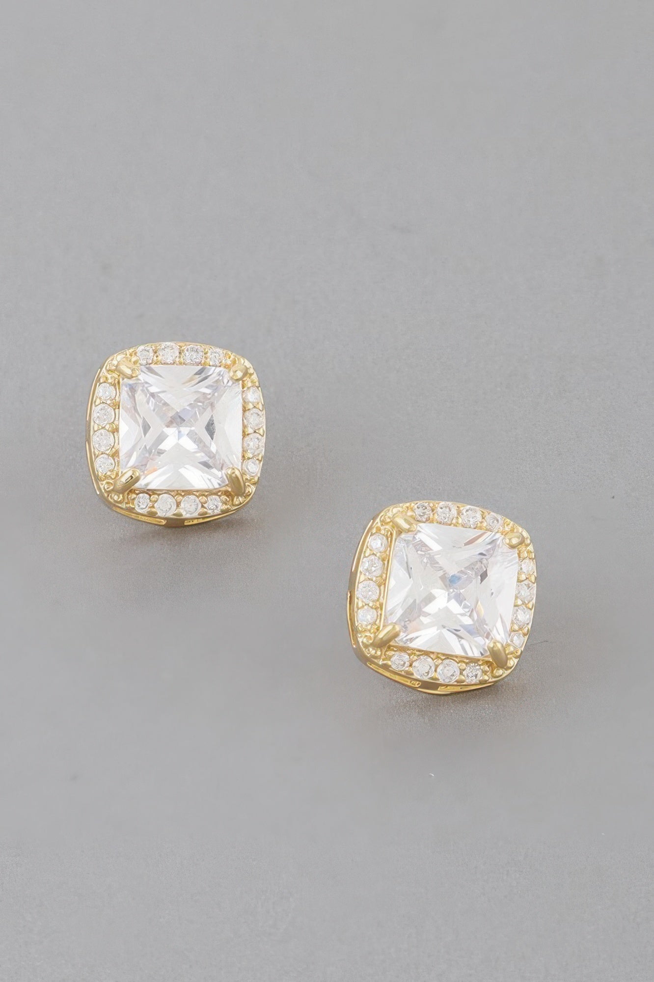 Gold-clear cubic rhinestone stud earrings with square cushion center stone