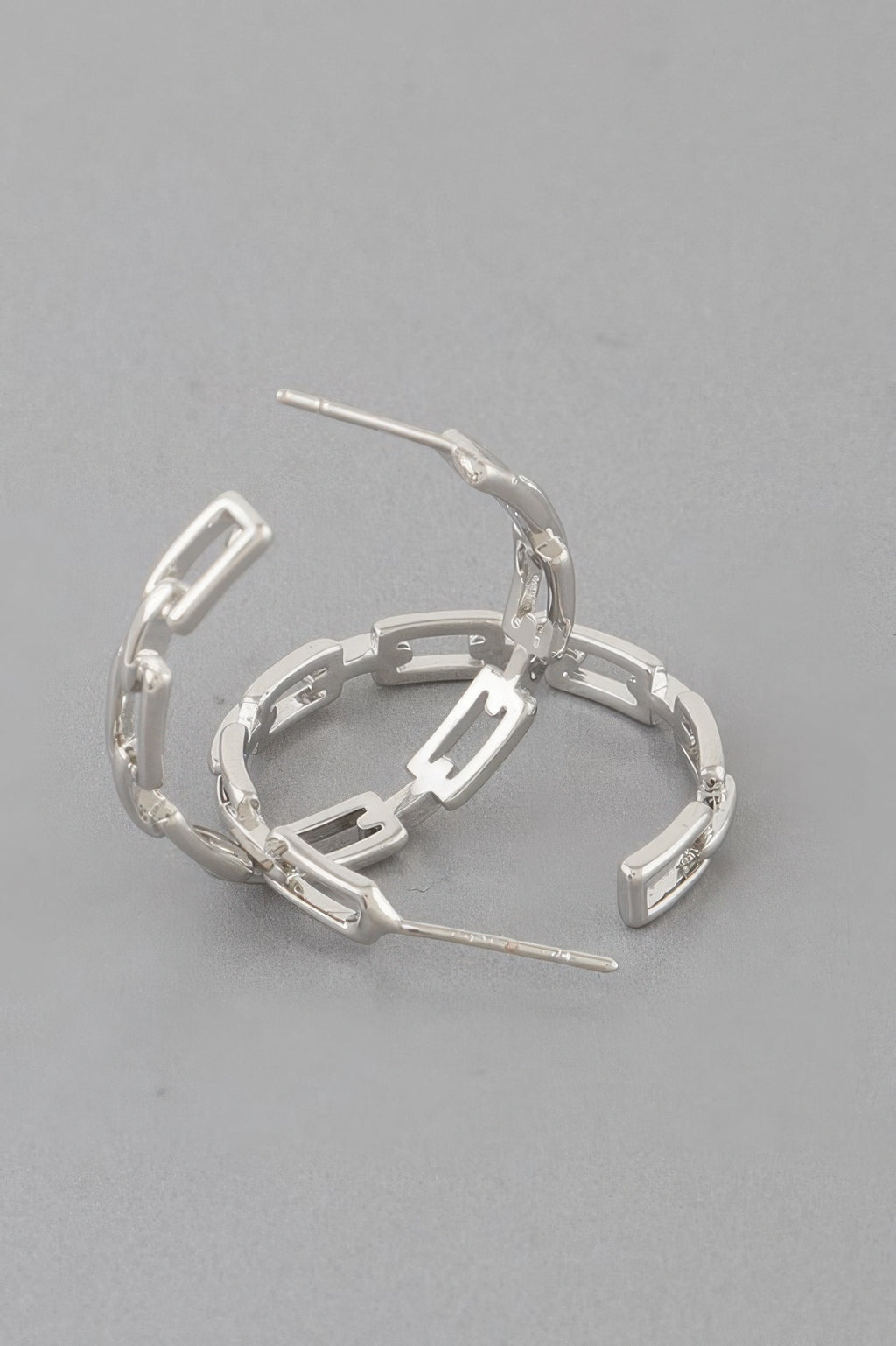 Silver-tone link chain hoop earrings with curved clasp and post backing