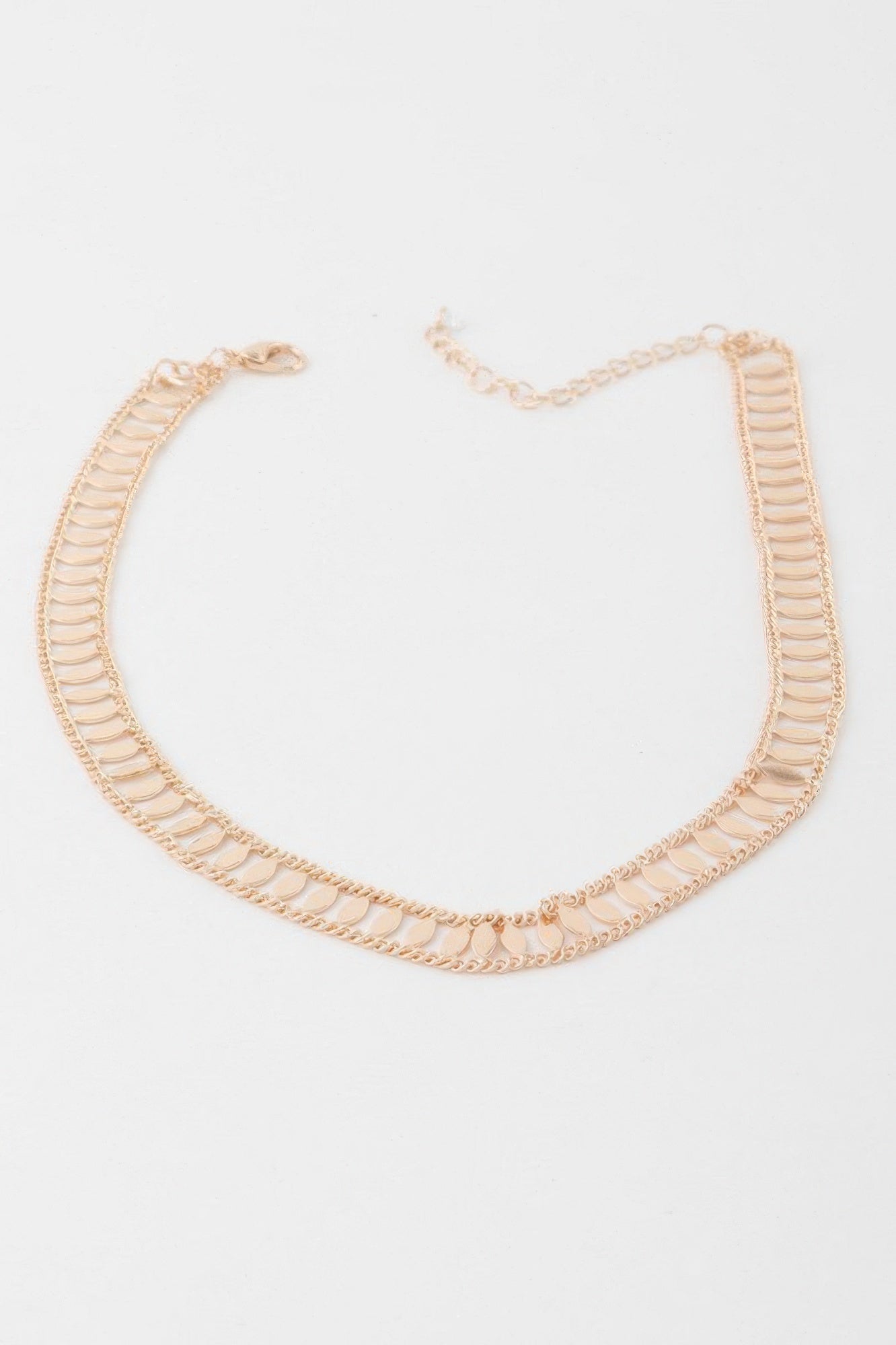 Gold leaf chain choker necklace with layered link design