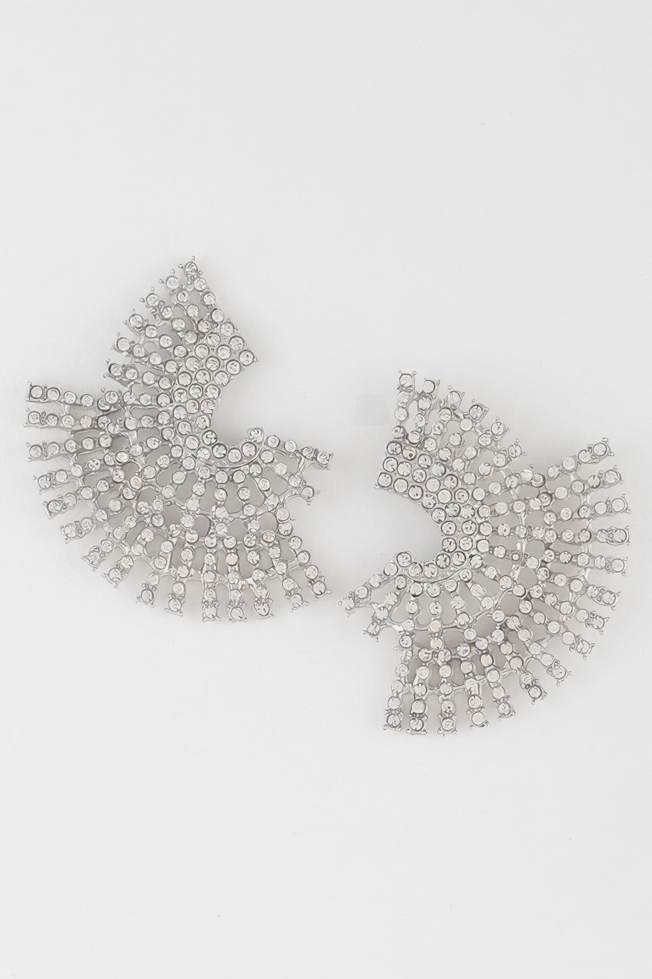 Silver-tone multi rhinestone disk earrings with fan-shaped, radiating stone discs