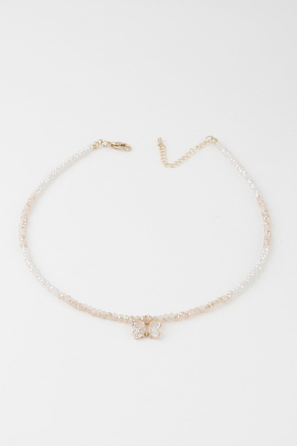 Crystal butterfly beaded necklace with pearl-like beads, gold clasp, white and gold