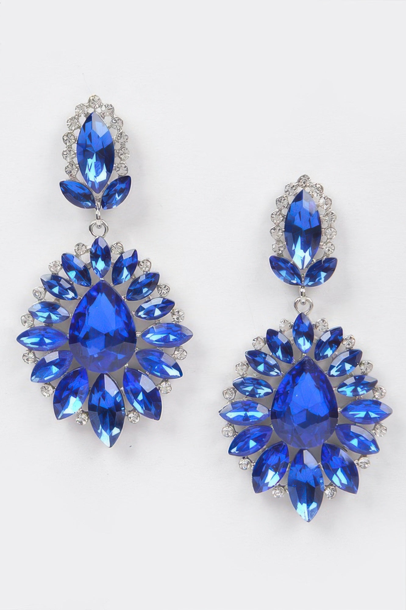 Rhinestone dangle earrings, cobalt blue teardrop center with faceted fringe