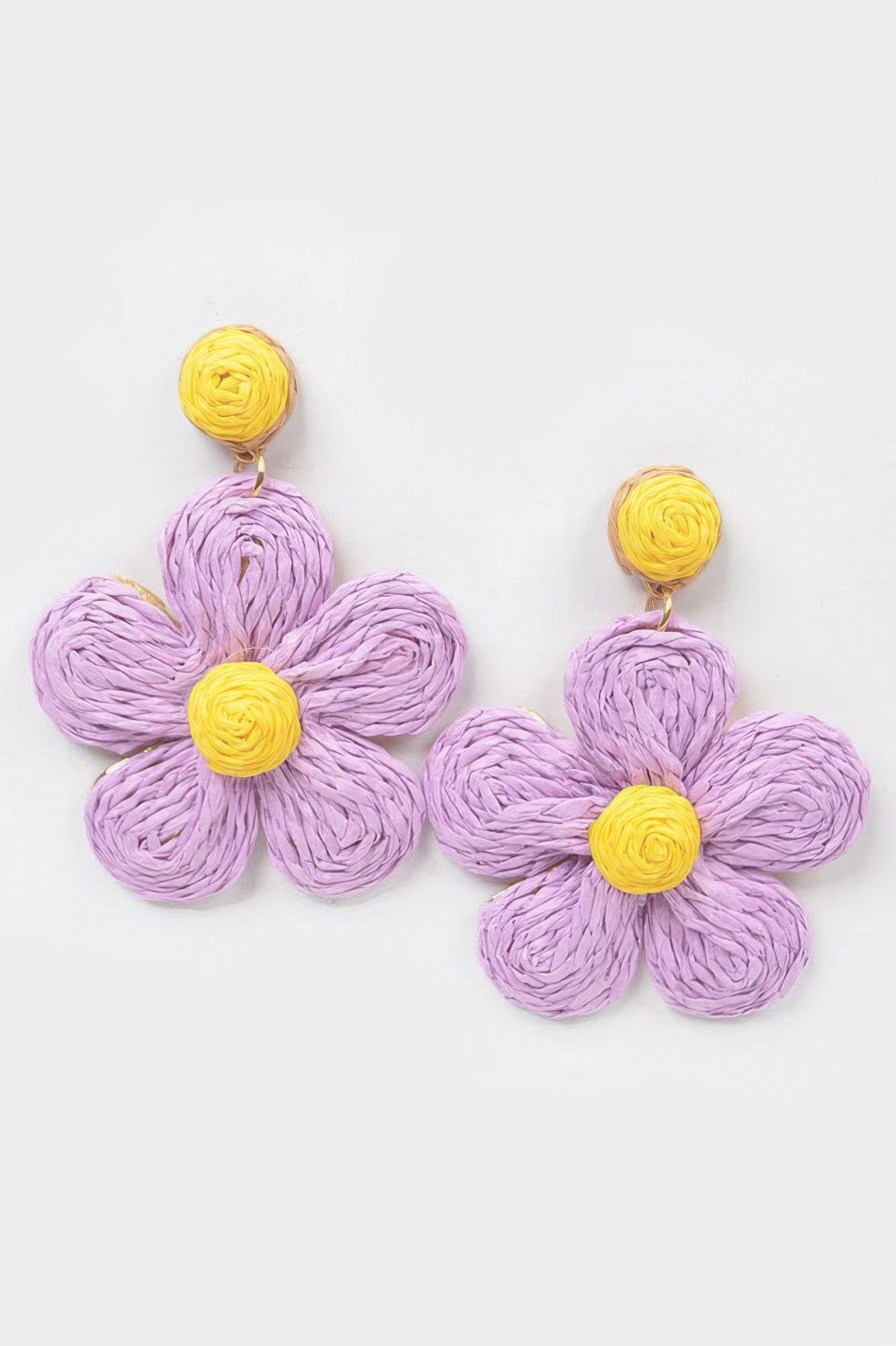 Handmade paper flower earrings in lavender with yellow flower centers