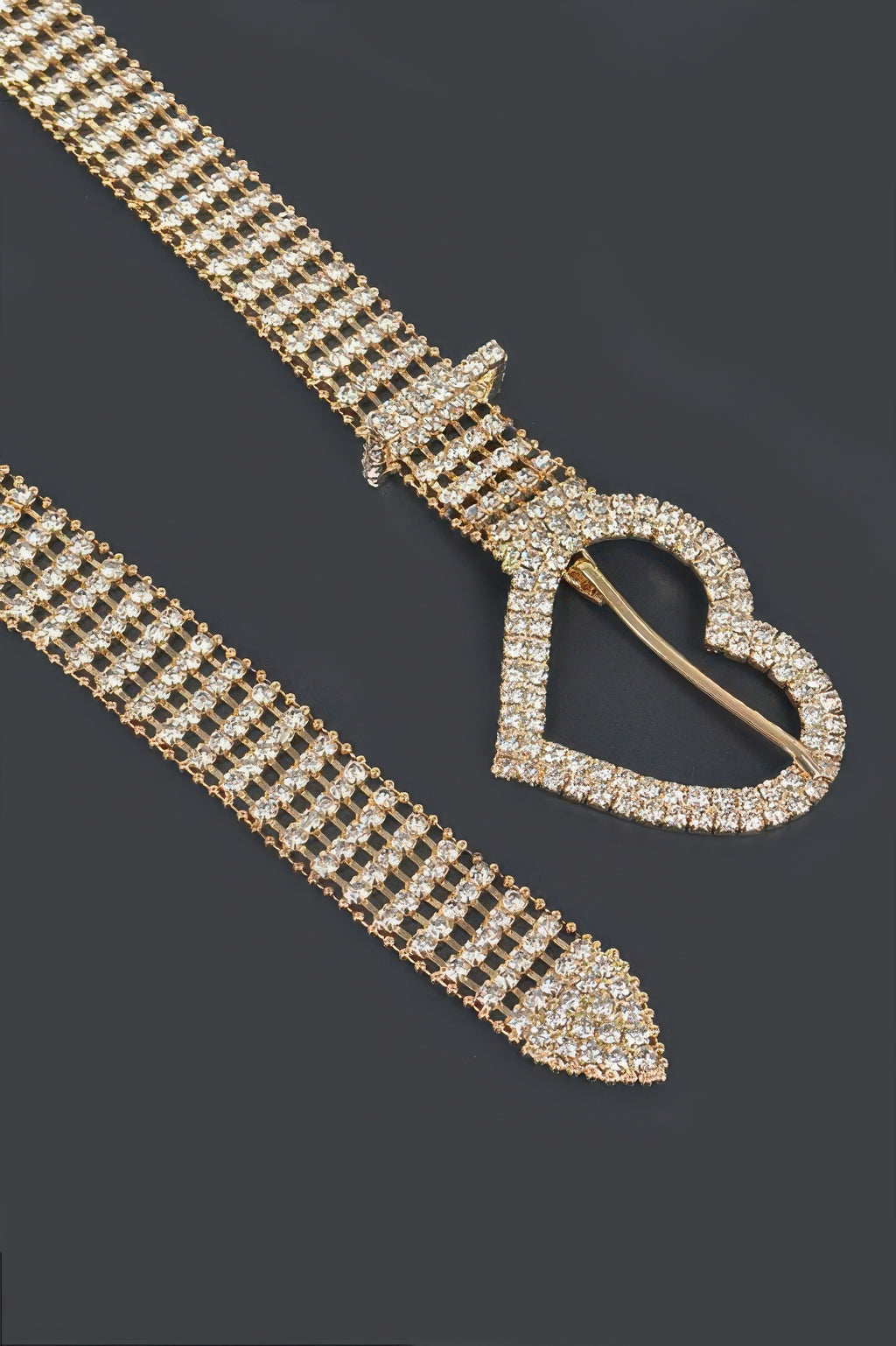 Gold heart-shaped rhinestone buckle with pin clasp on belt