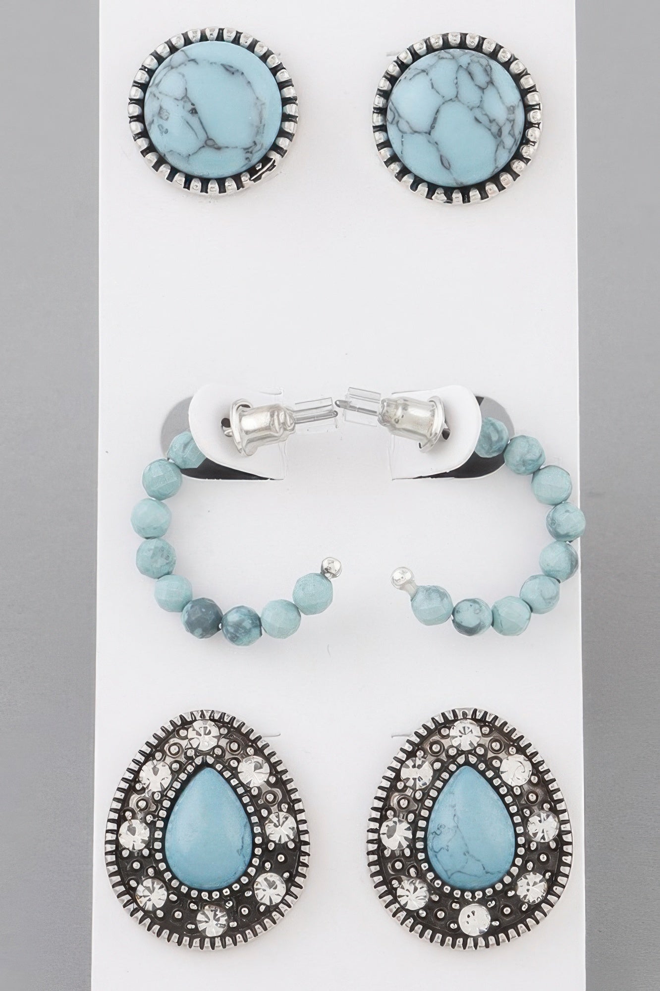 Turquoise antique earring set: bezel cabochons, silver hoops, beaded hoops.