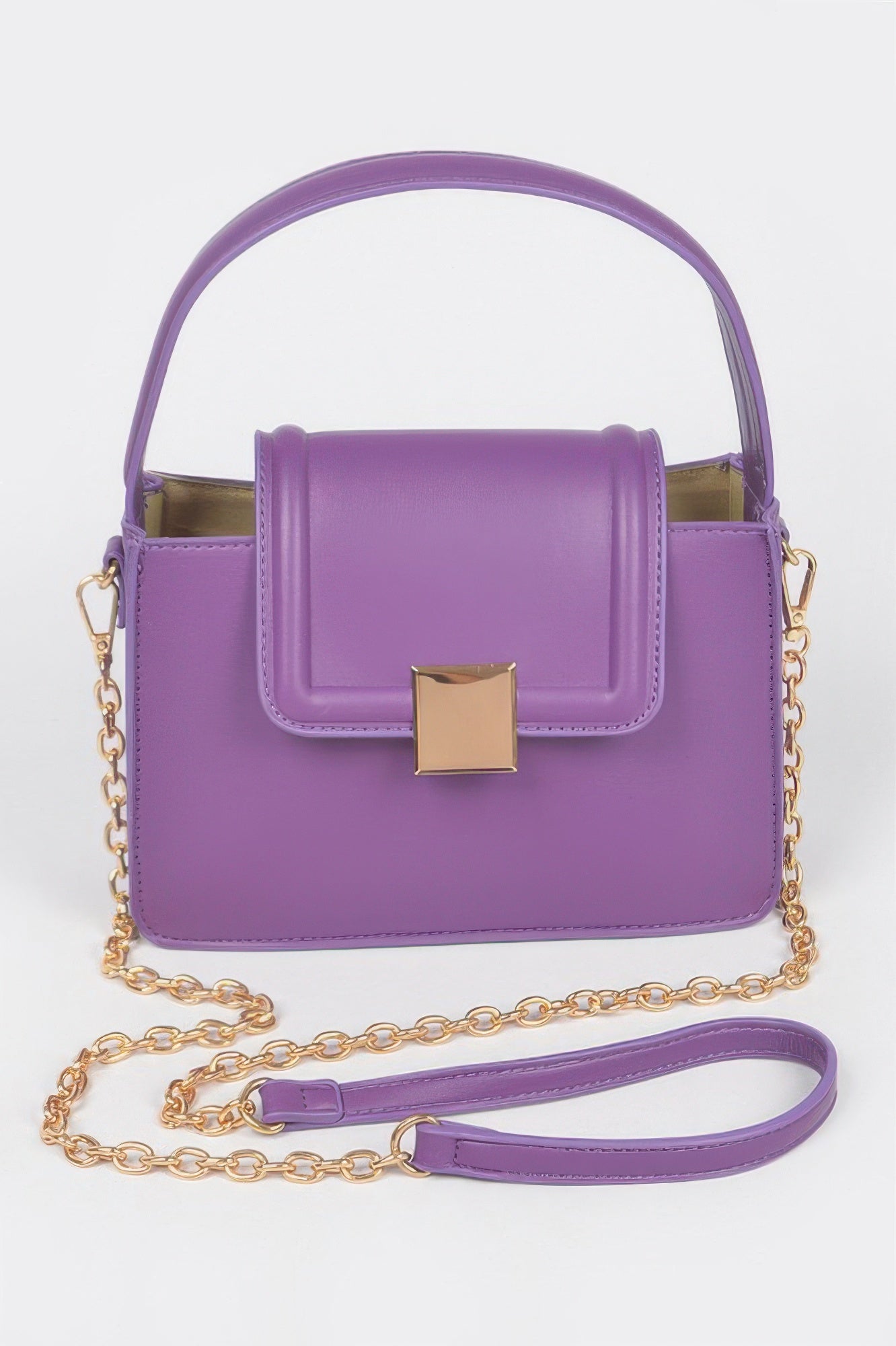 Faux leather crossbody bag in purple with top handle, gold-tone chain, and front flap clasp