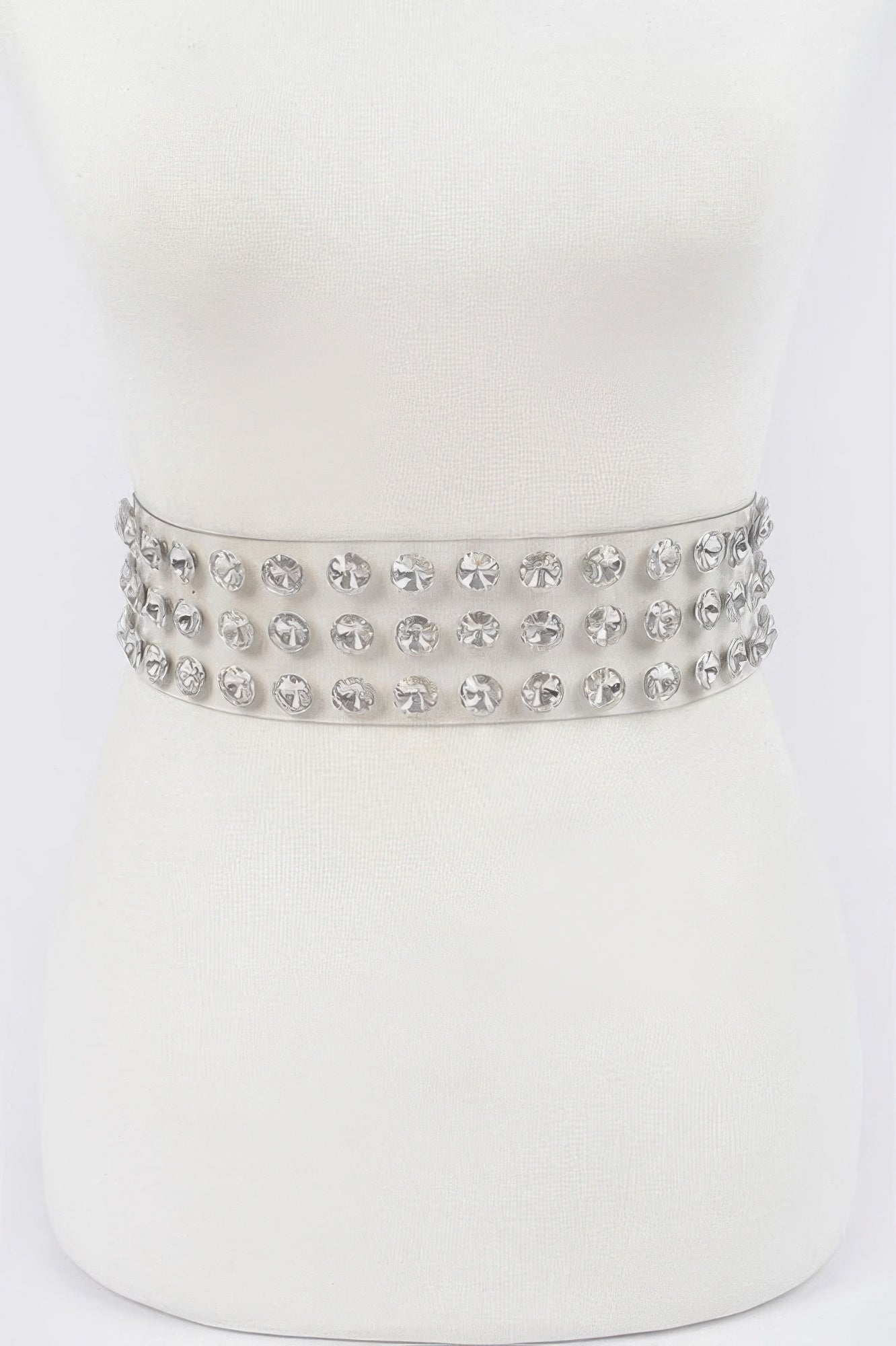 Clear waist belt with rows of large round rhinestones, silver-toned setting