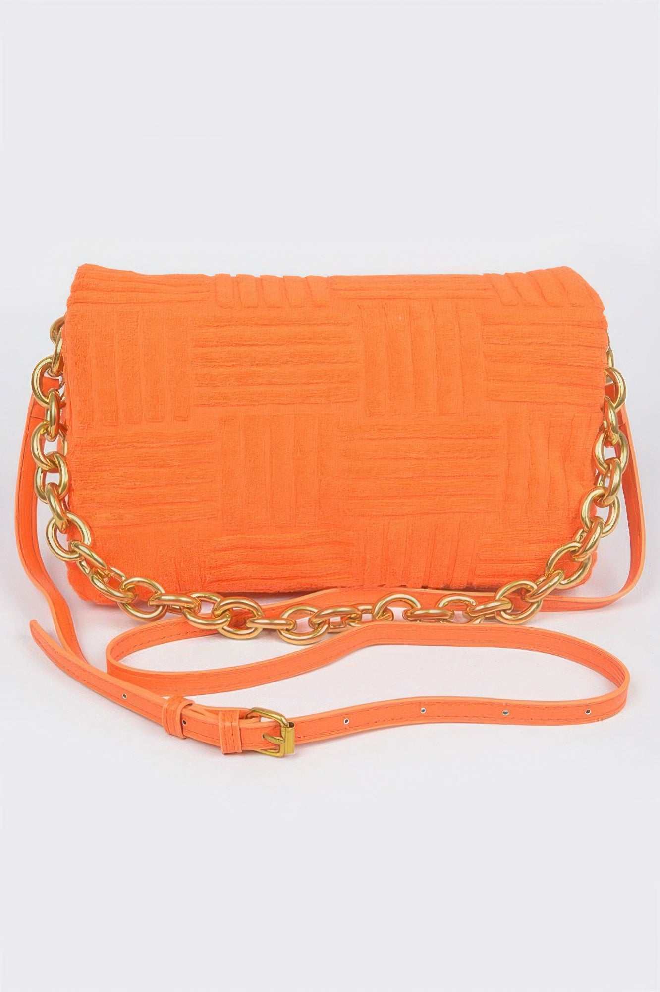 Orange embossed chain flap bag with gold-tone chain strap and leather trim