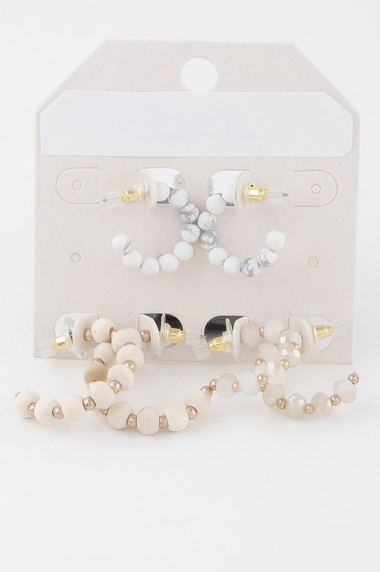 Crystal Bead Hoop Earrings Set in white beads with gold-tone posts and hoop hooks