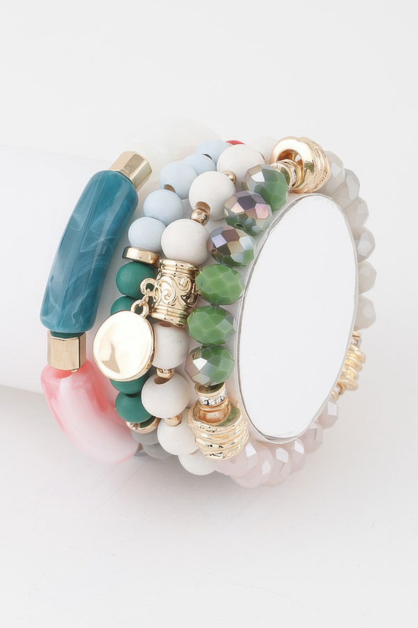 Multi crystal pendant bracelet with colorful bead strands and gold-tone charm pieces