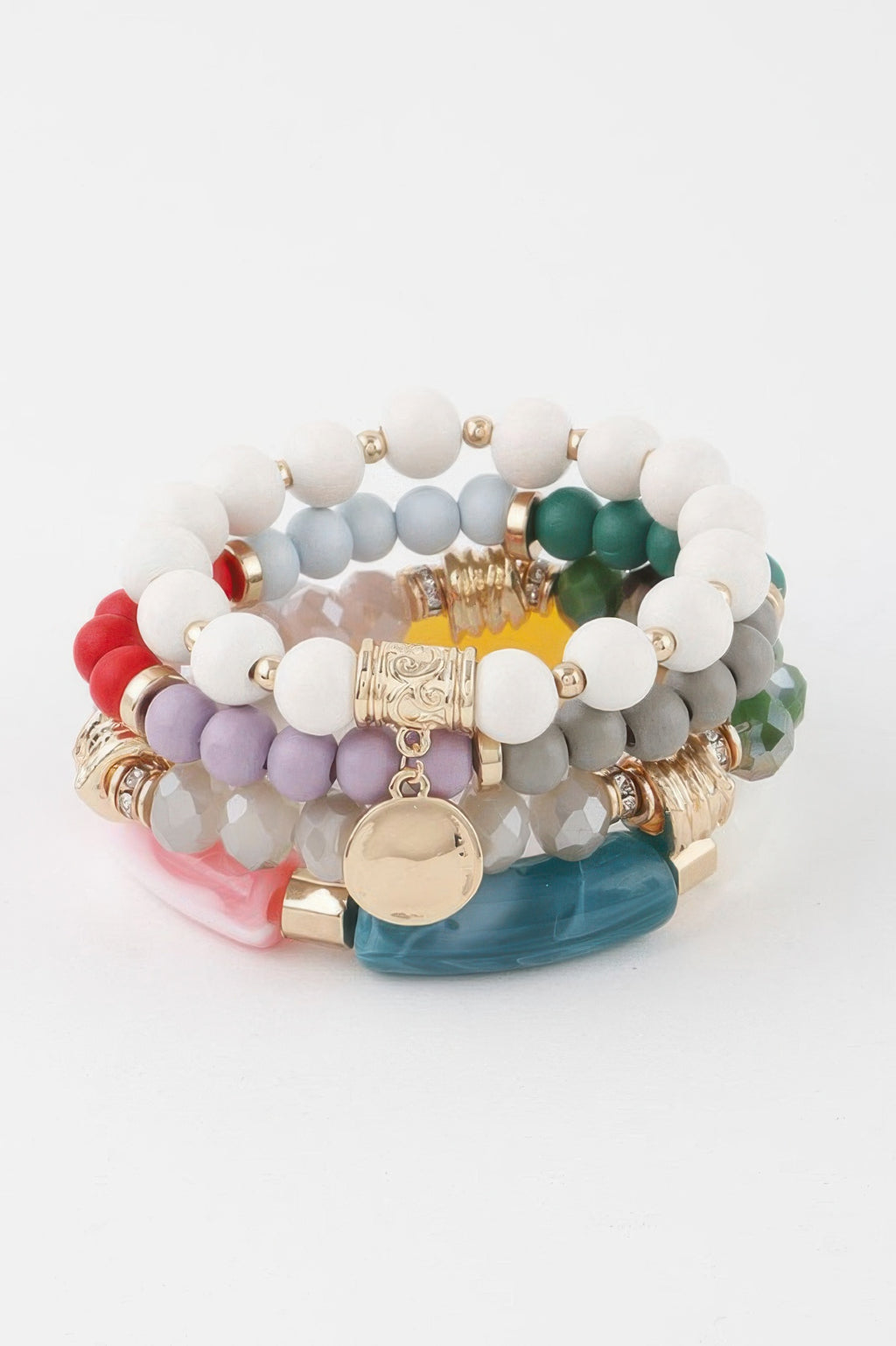 Stacked view of multicolor bead bracelet with circular gold pendant and hanging charm
