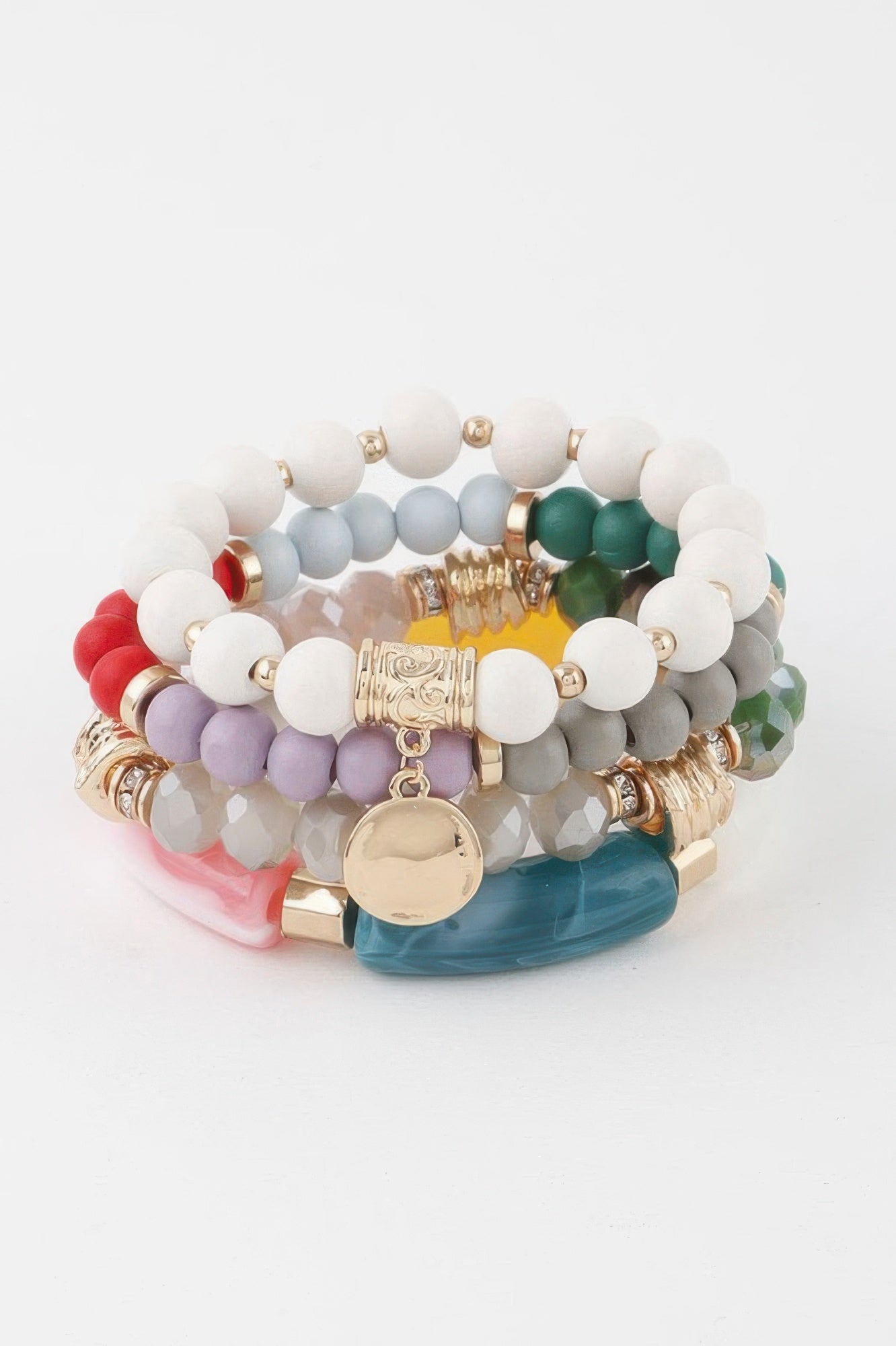 Stacked view of multicolor bead bracelet with circular gold pendant and hanging charm