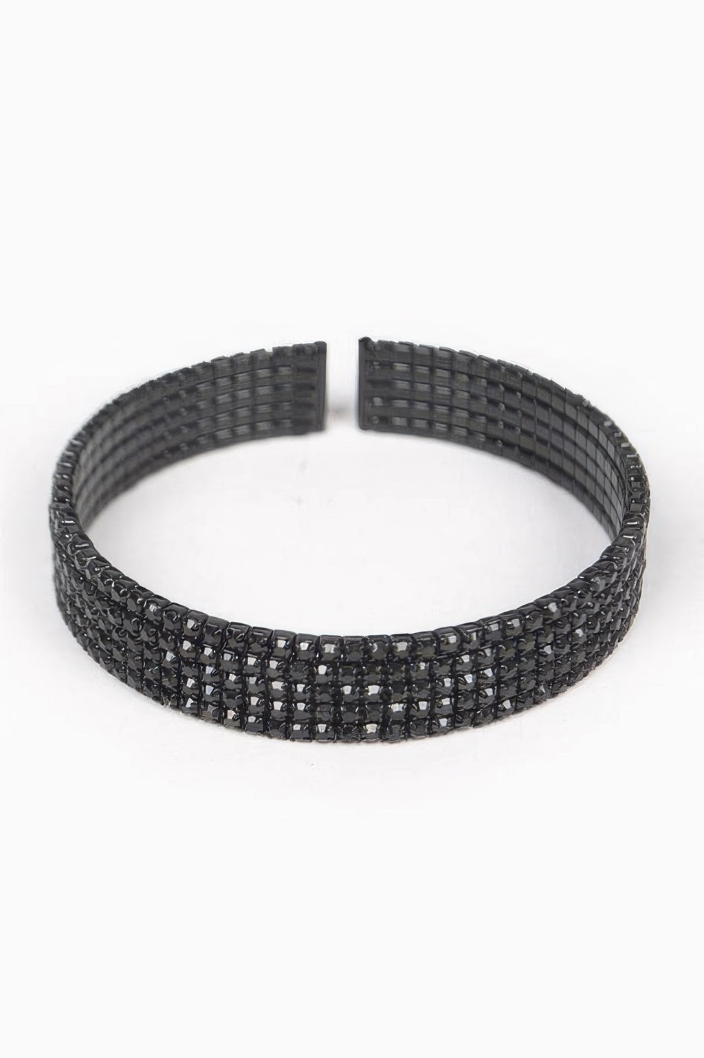 Black wrap rhinestone bangle with stacked rows and open clasp