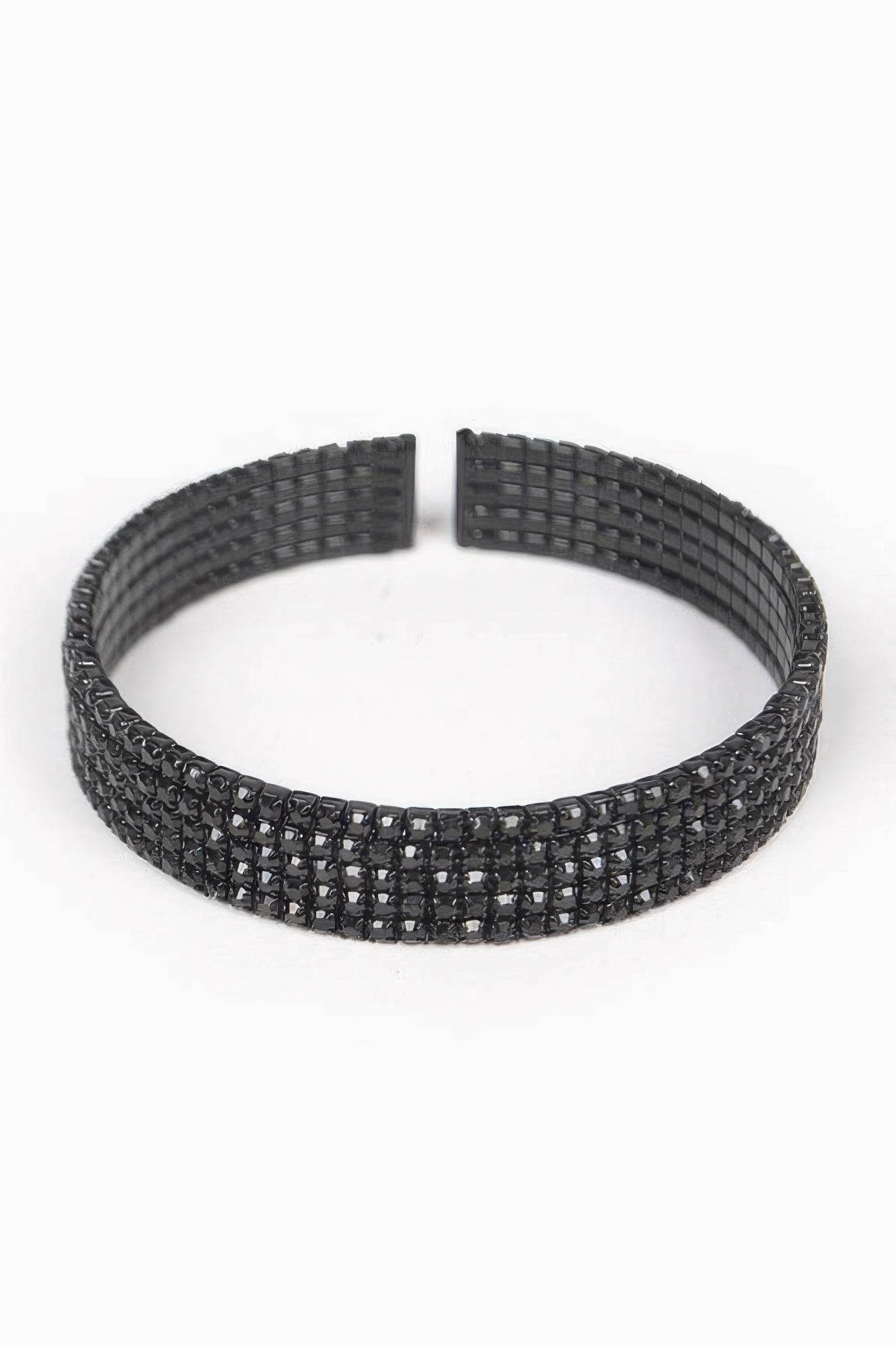Black wrap rhinestone bangle with stacked rows and open clasp