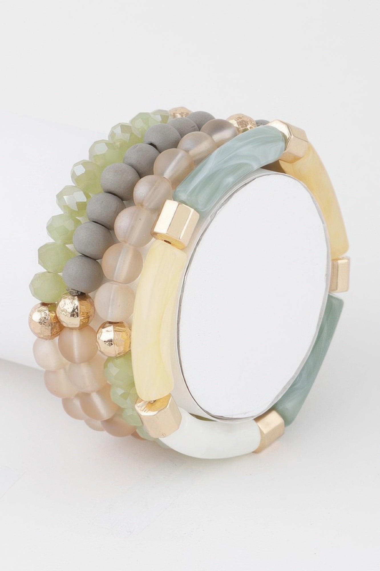 Green multi-beaded tube bracelet with gold-tone spacers and tube beads