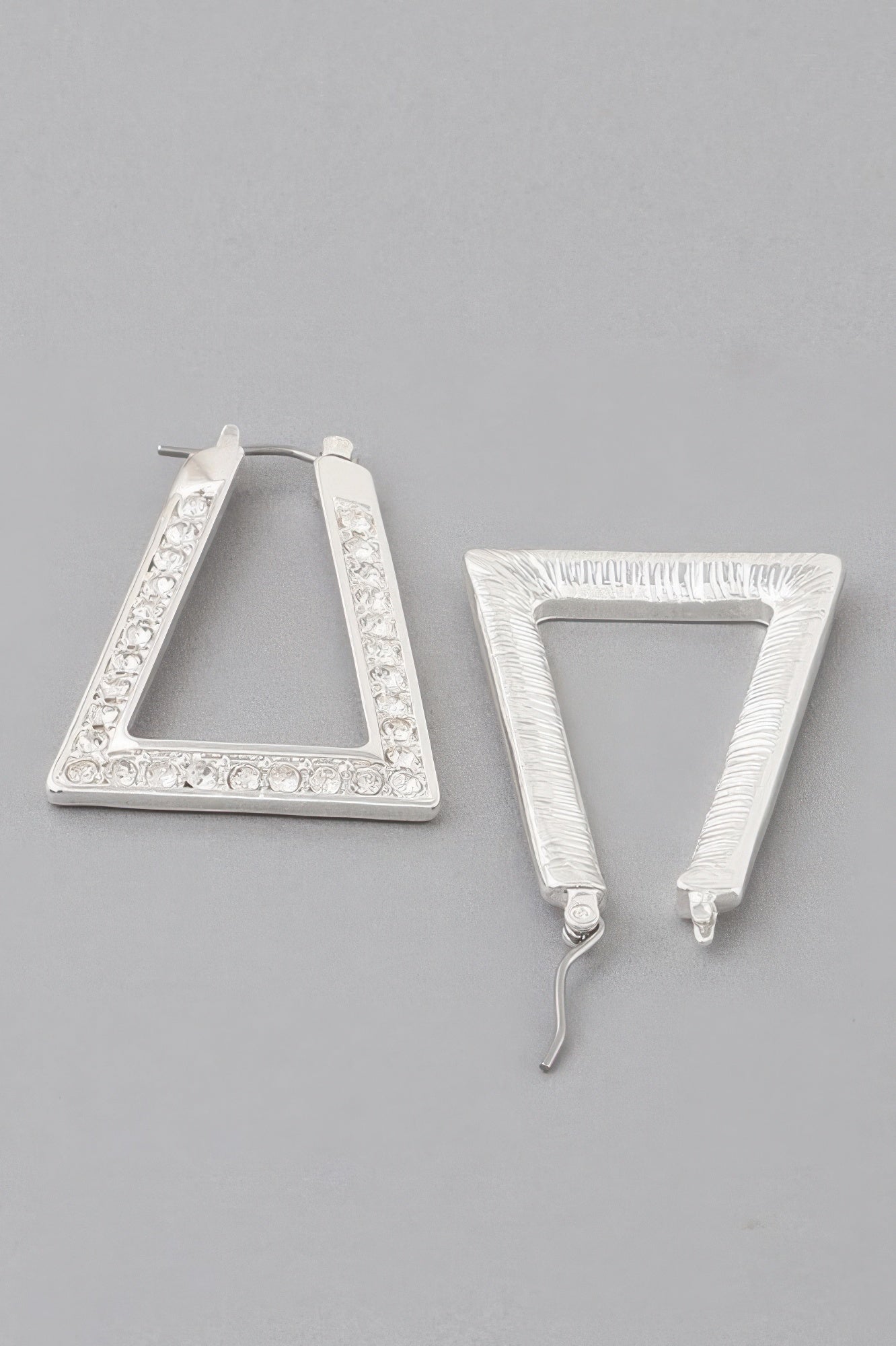 Geometric triangle rhinestone earrings, silver-tone frame with clear crystals
