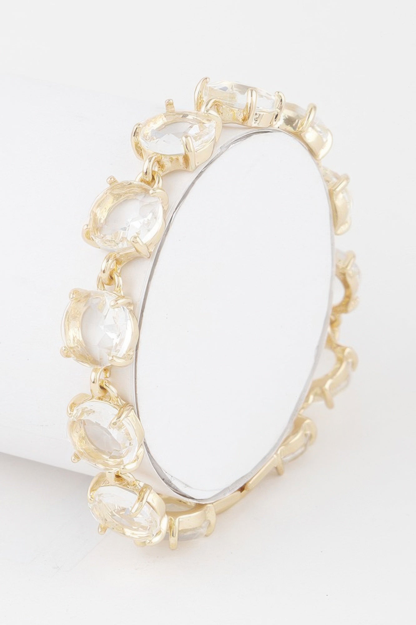 Crystal chain bracelet with clear faceted stones and gold-tone prong setting