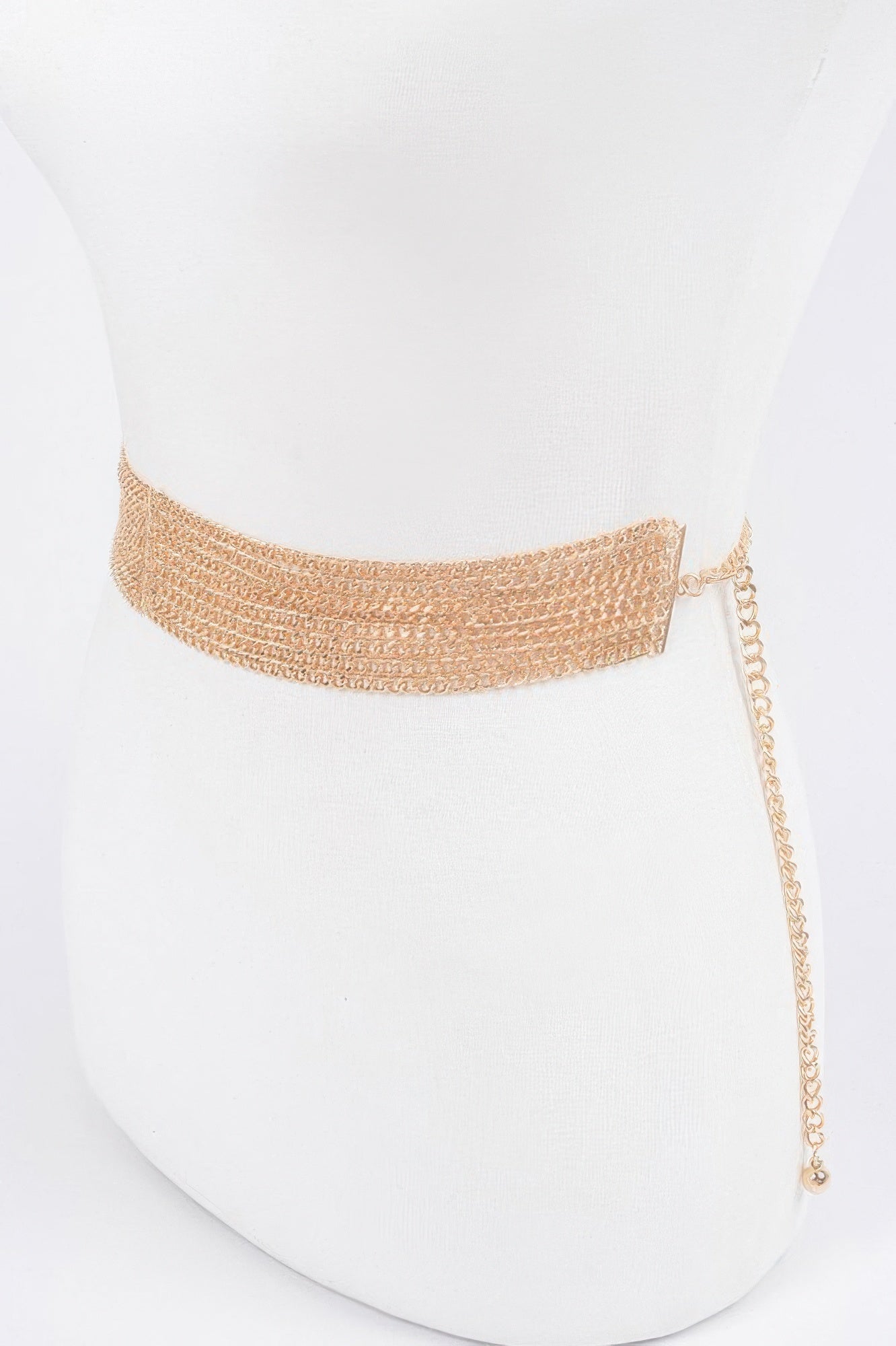 Gold wide multi-chain belt with dangling chain end and clasp detail