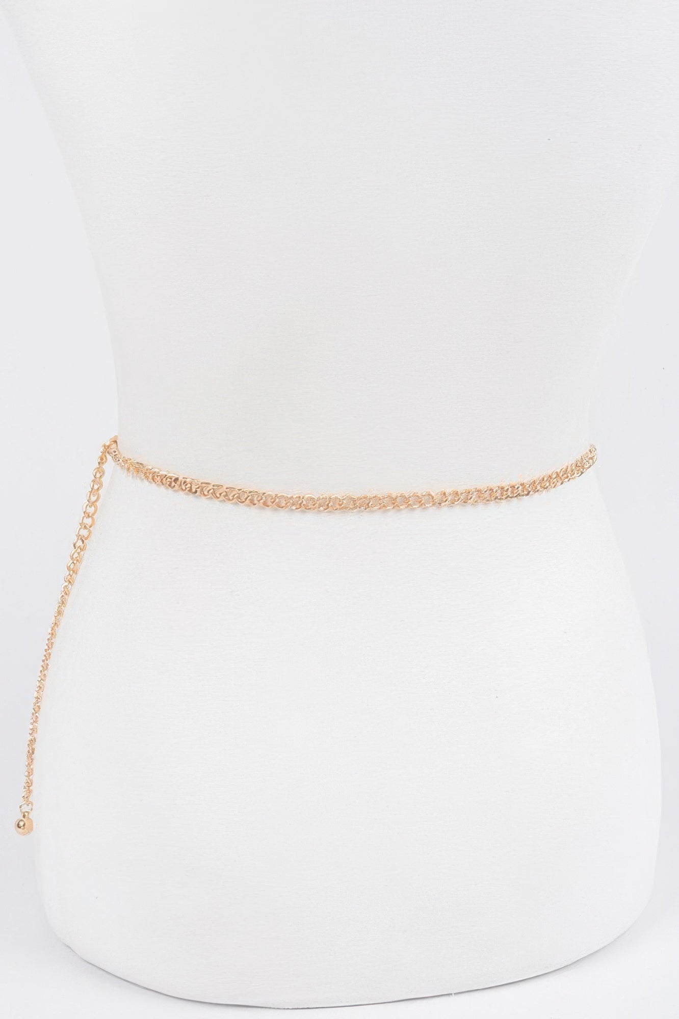 Gold multi-chain belt with long dangling chain and small bead charm
