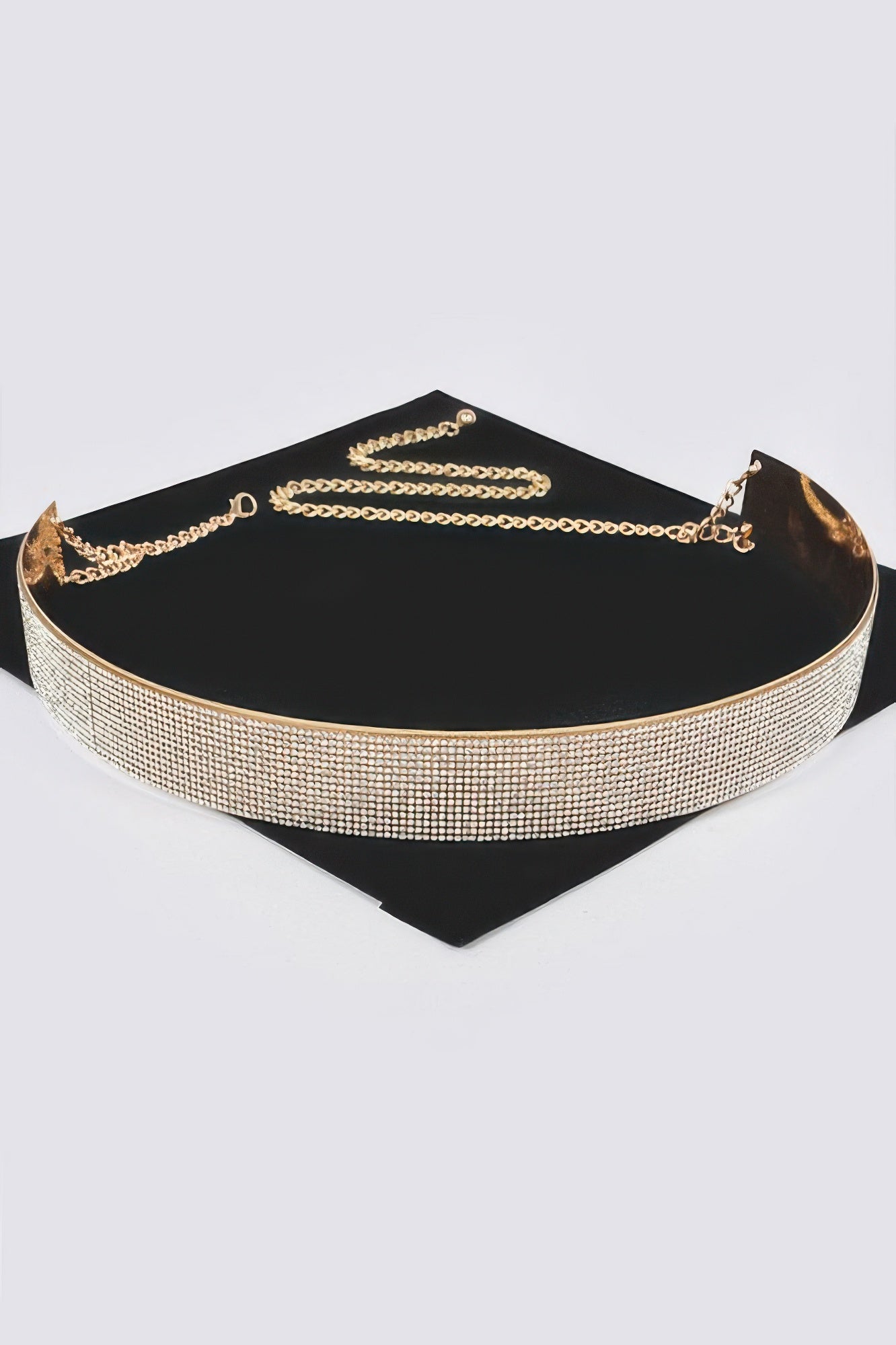 Wide gold rhinestone belt with layered chain drape on black backing