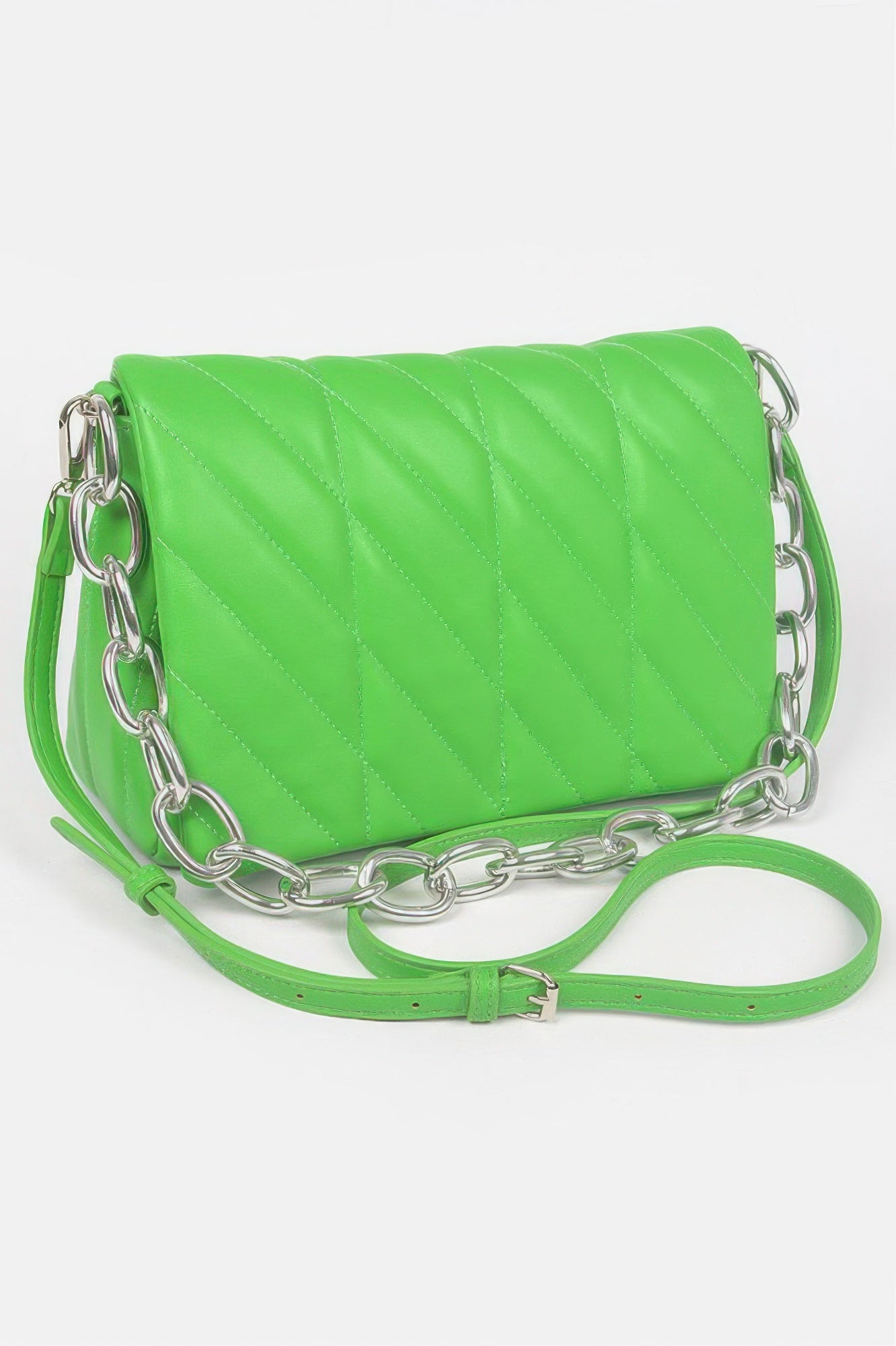 Green quilted chain shoulder bag with chevron stitching and silver curb chain