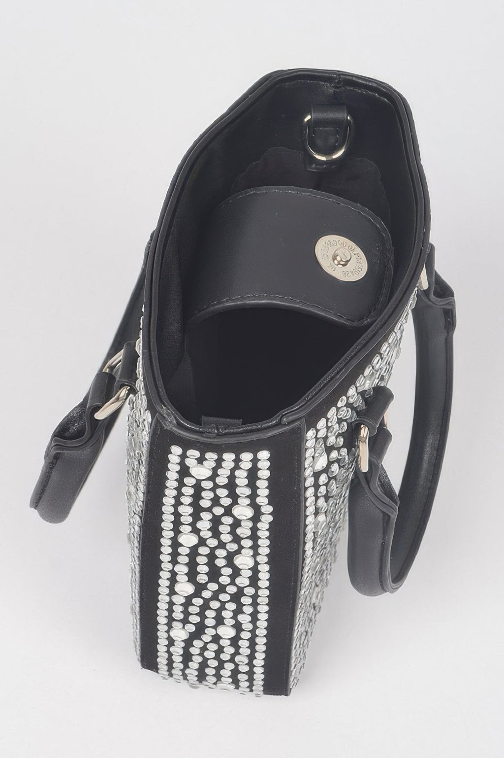 Inside view of Hotfix crossbody bag in black with open top and rhinestone trim