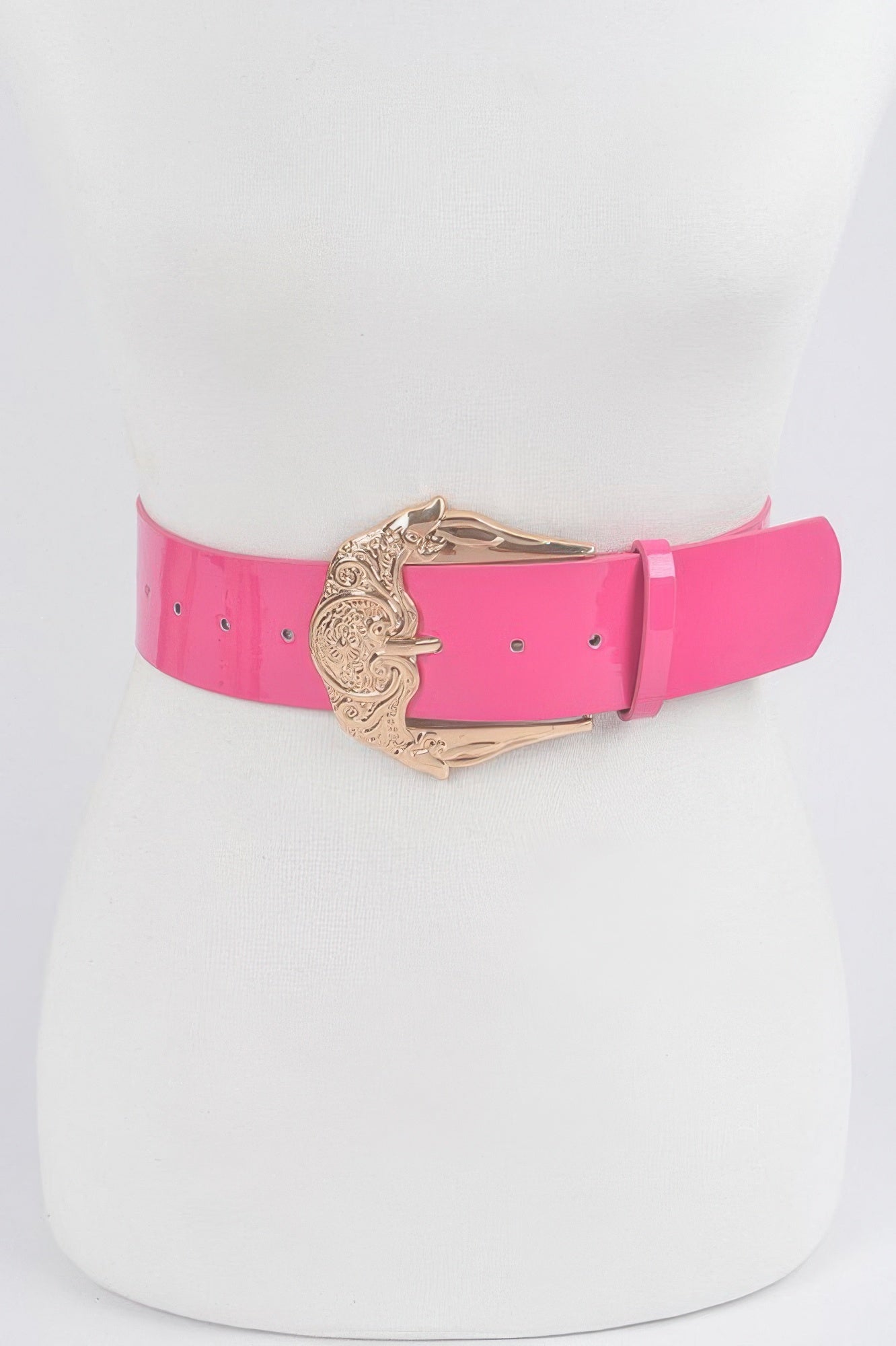 Shiny enamel belt in fuchsia pink with ornate gold-tone metal buckle and eyelets